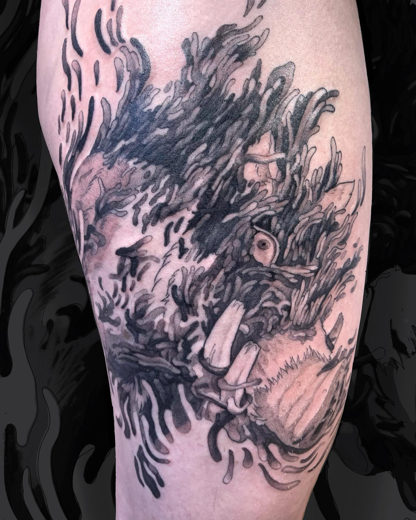 Lion black and grey tattoo on the thigh by Sarah