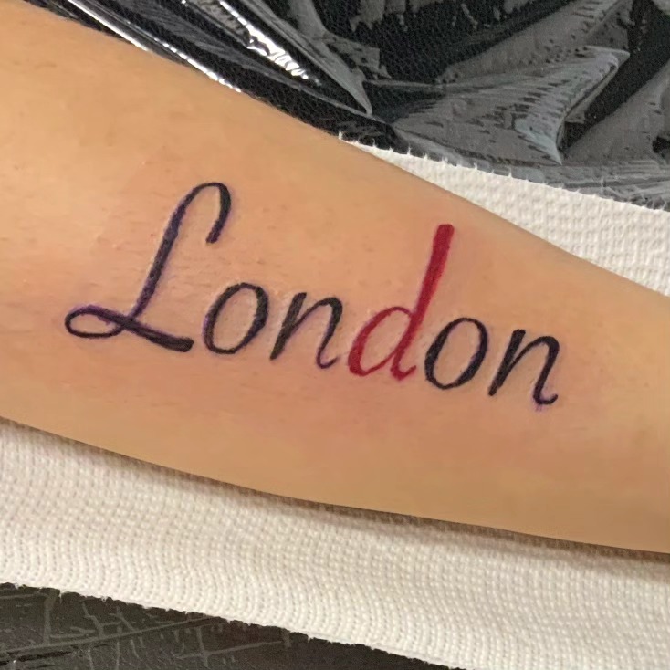 London text lettering tattoo on the forearm by Lopez Dautruche