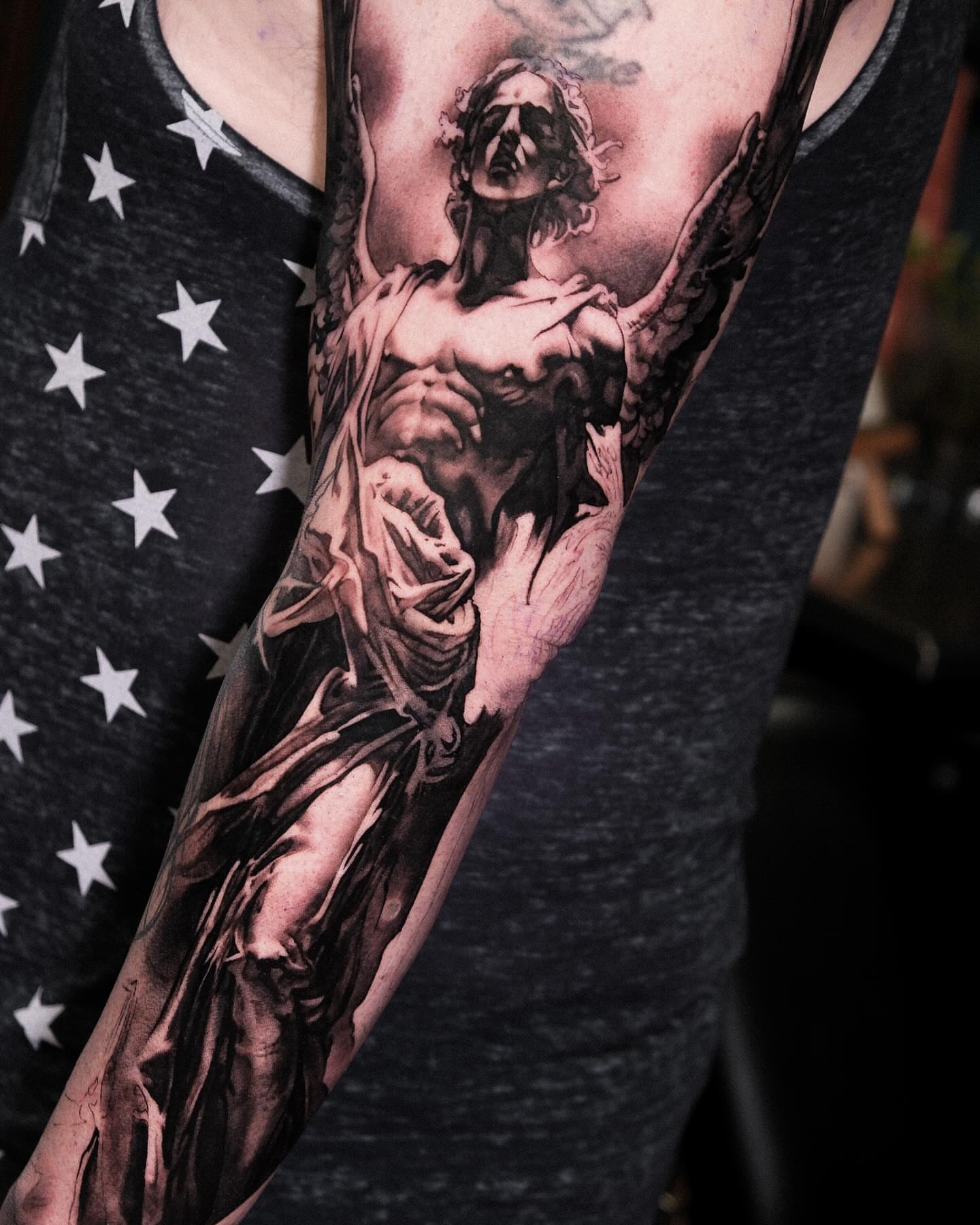 Angel realism tattoo on the forearm by Anastasia Ritova