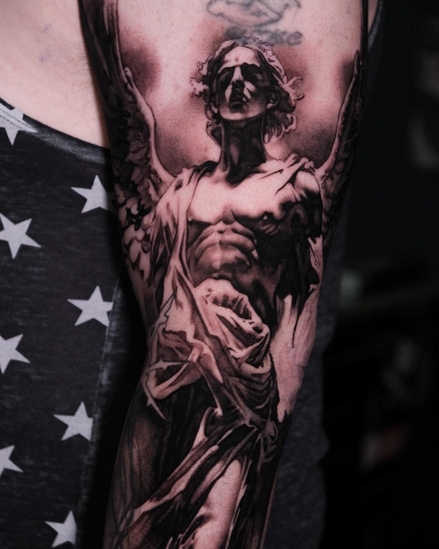 Religious figure realism tattoo on the forearm by Anastasia Ritova