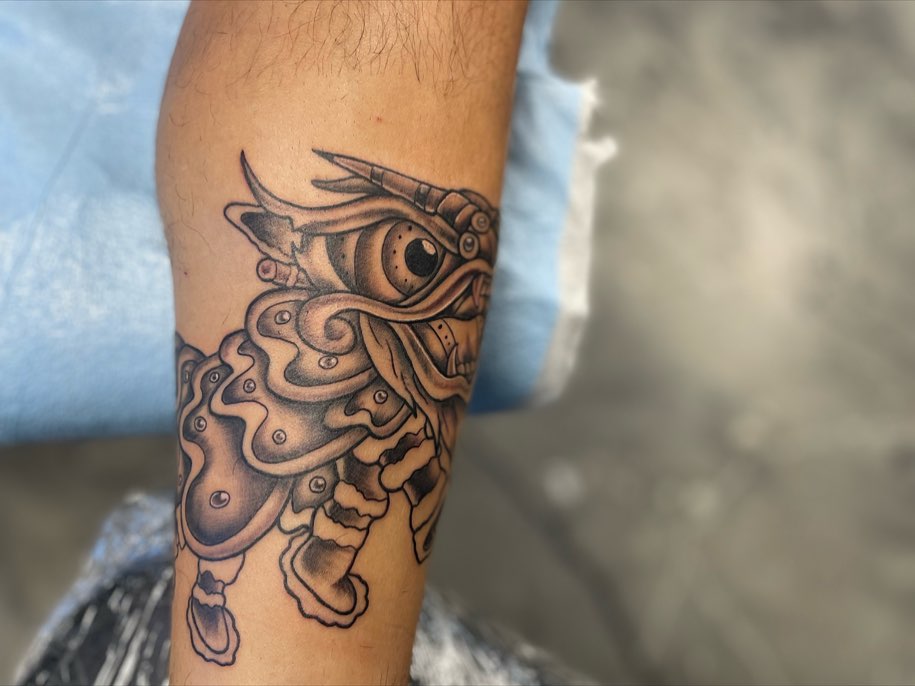 Robotic eye geometric tattoo on the forearm by Brandon Anderson