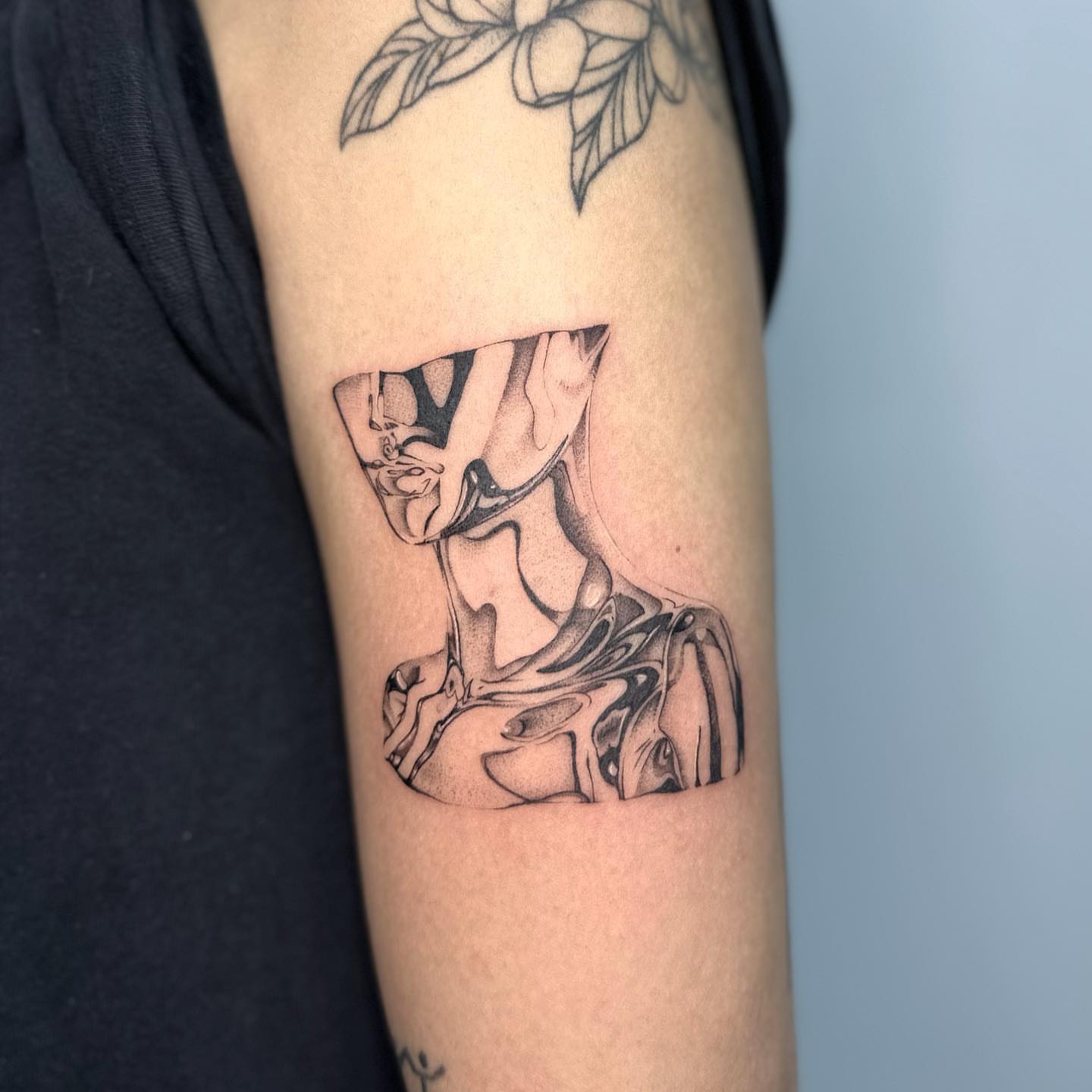 Abstract figure dotwork tattoo on the forearm by ๐๐๐๐ ๐๐๐๐
