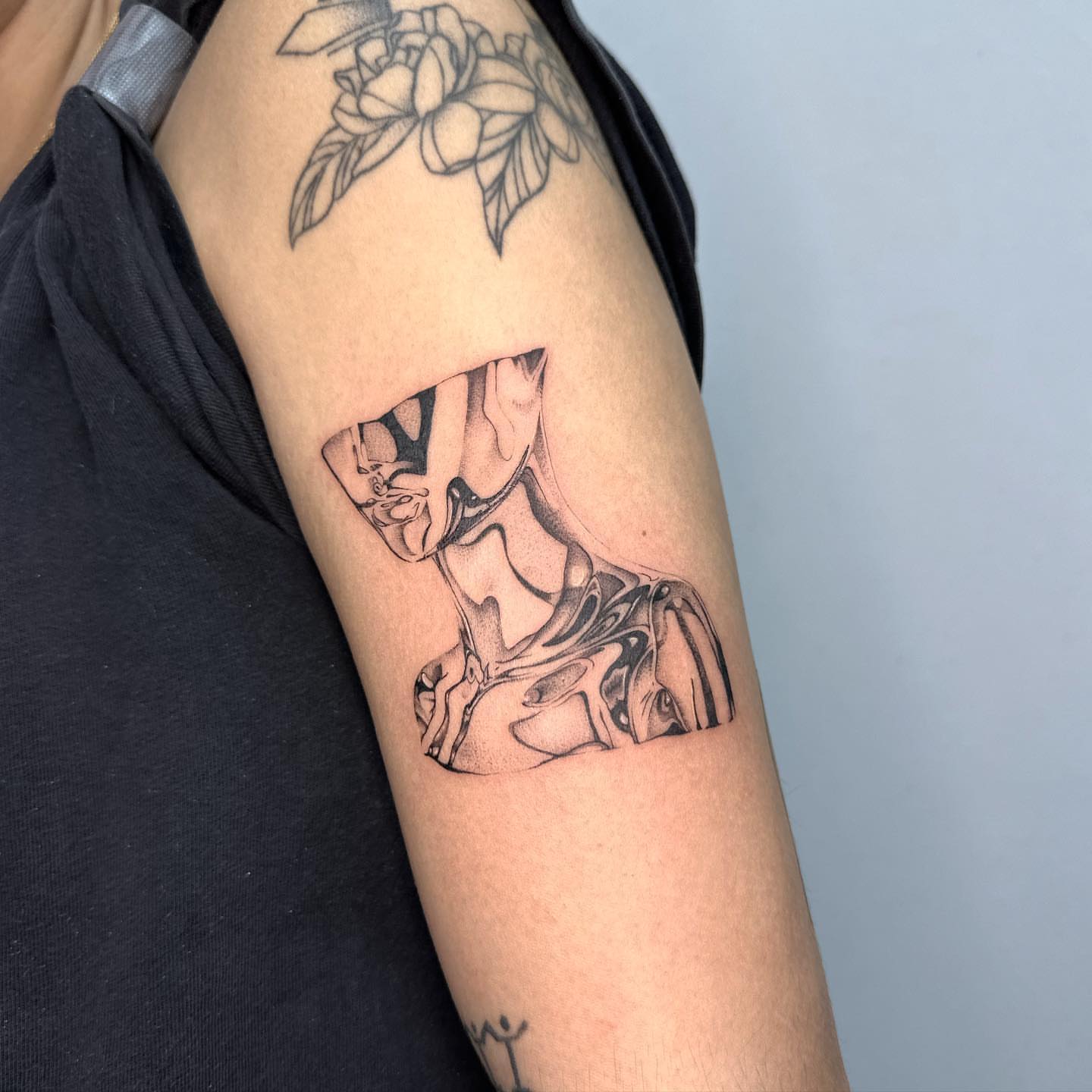 Abstract figure dotwork tattoo on the forearm by ๐๐๐๐ ๐๐๐๐