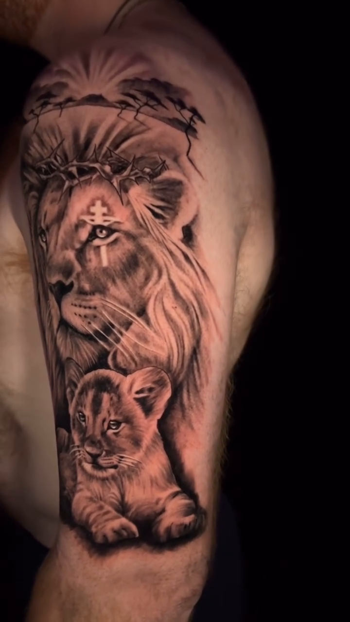 Lion with cubs realism tattoo by Xando