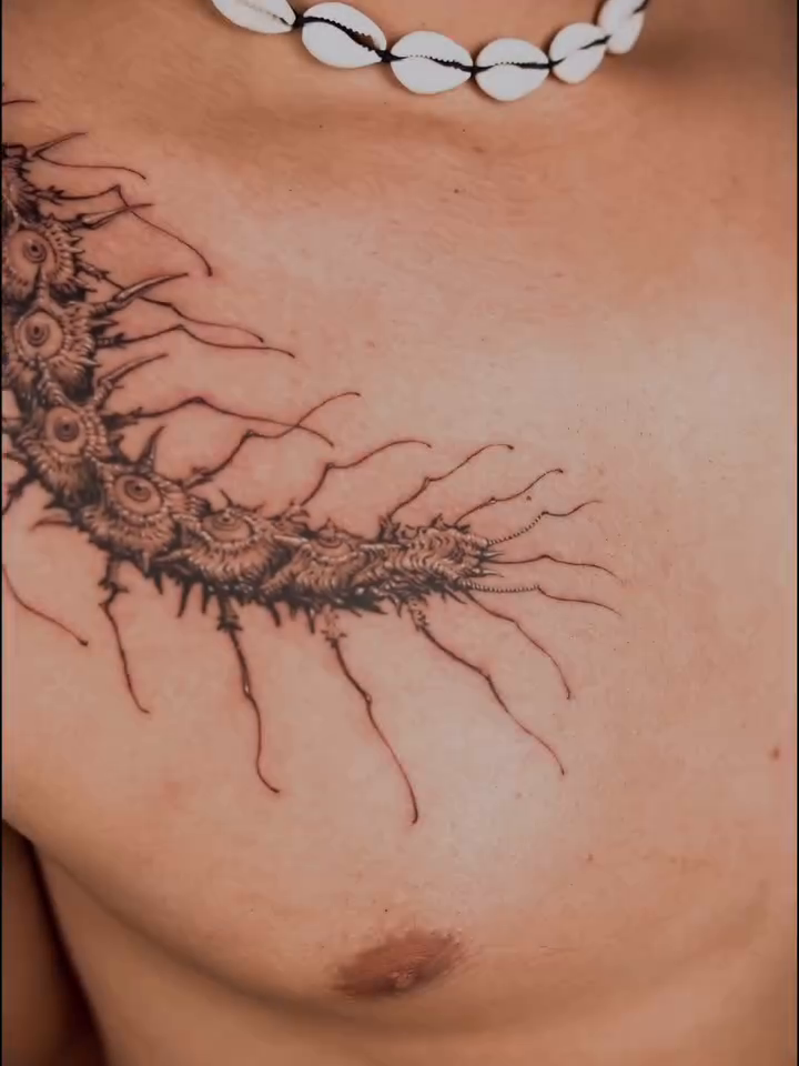 Tattoo by @nowthisyujhi — black_and_grey, dark_realism
