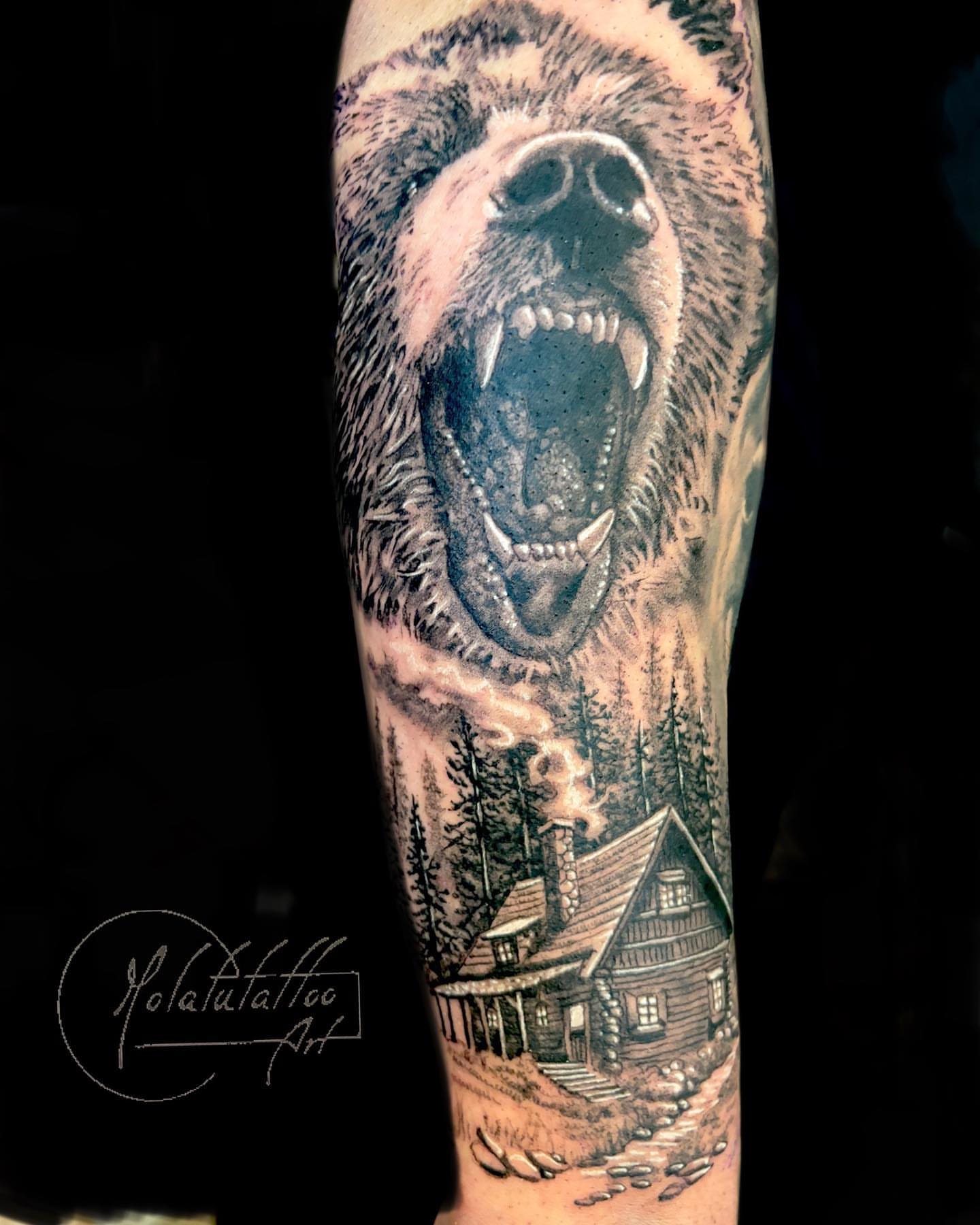 Bear realism tattoo on the forearm by Molatutattoo