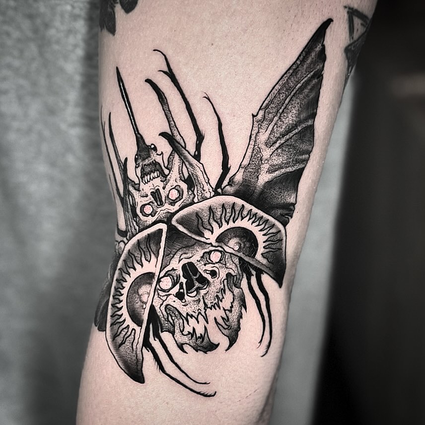Tattoo by @carterclvn — black_and_grey, dark_realism