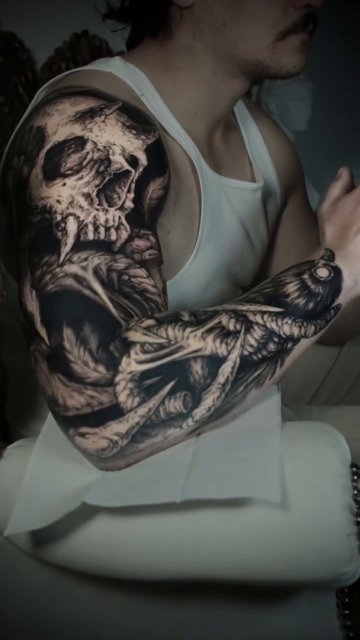 Skull and snake sleeve realism tattoo by Hollow Priest