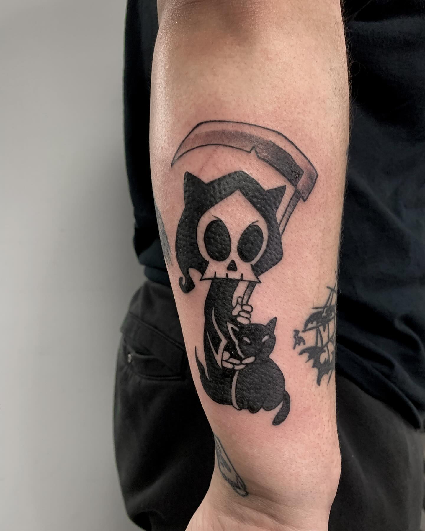 Grim reaper and cat black and grey tattoo on the forearm by ✿ Desiree Gawle ✿