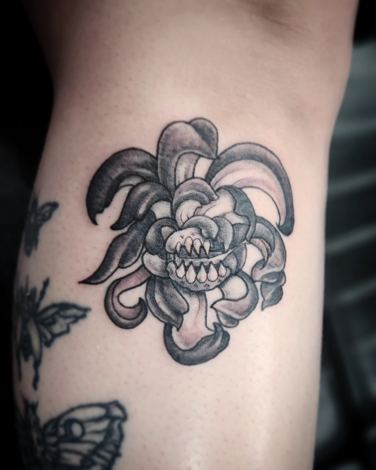 Tattoo by @ladymonsterfacetattoos — black_and_grey