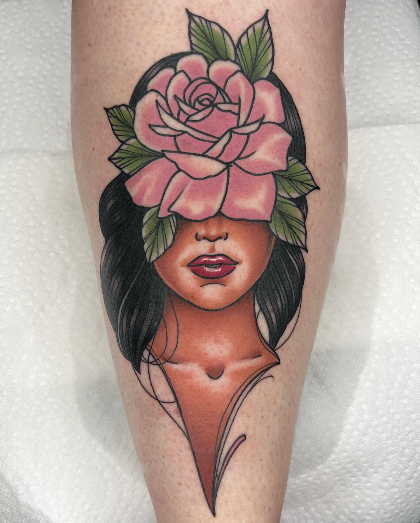 Woman with rose American traditional tattoo on the forearm by Matt Misiak
