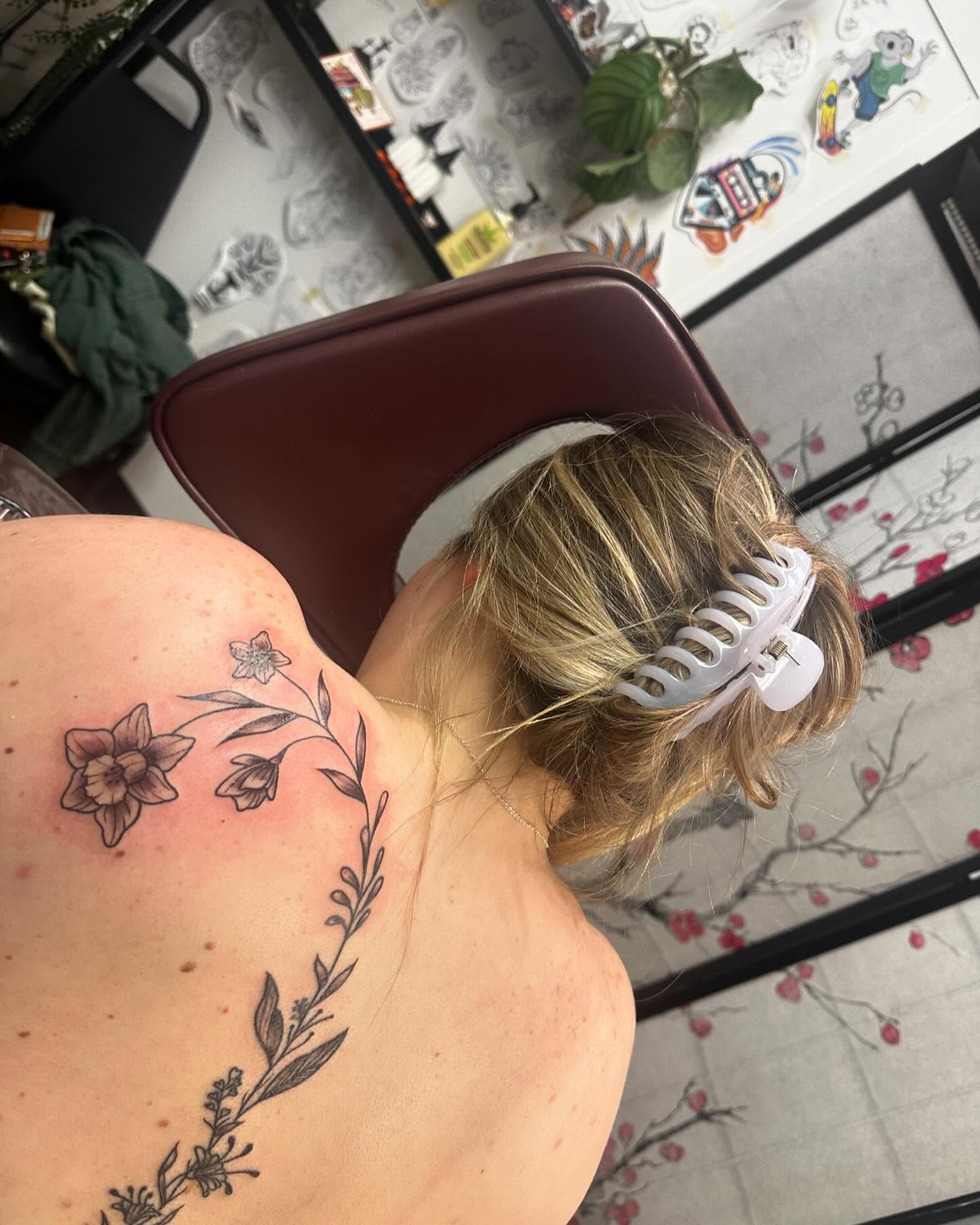 Floral wreath black and grey tattoo on the shoulder by Kassie Perian