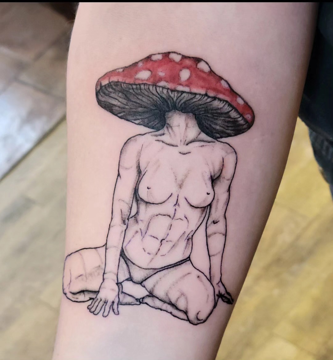 Mushroom woman realism tattoo on the forearm by Tim Andrews