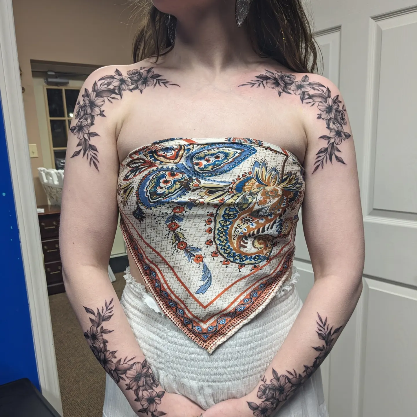 Floral bandana black and grey tattoo on the chest by Kara Falcon