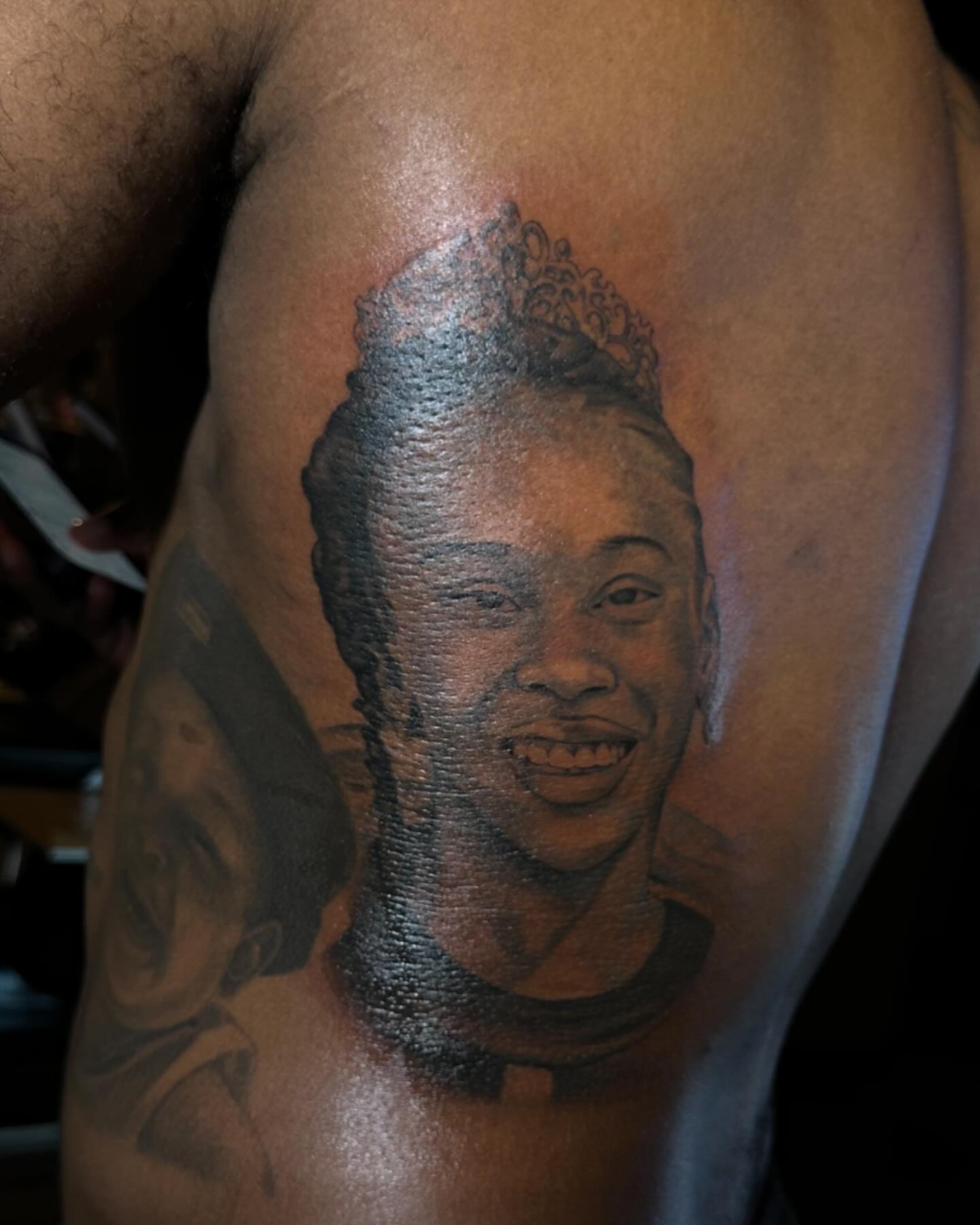 Portrait realism tattoo on the shoulder by Jevon Glasco Tattoos