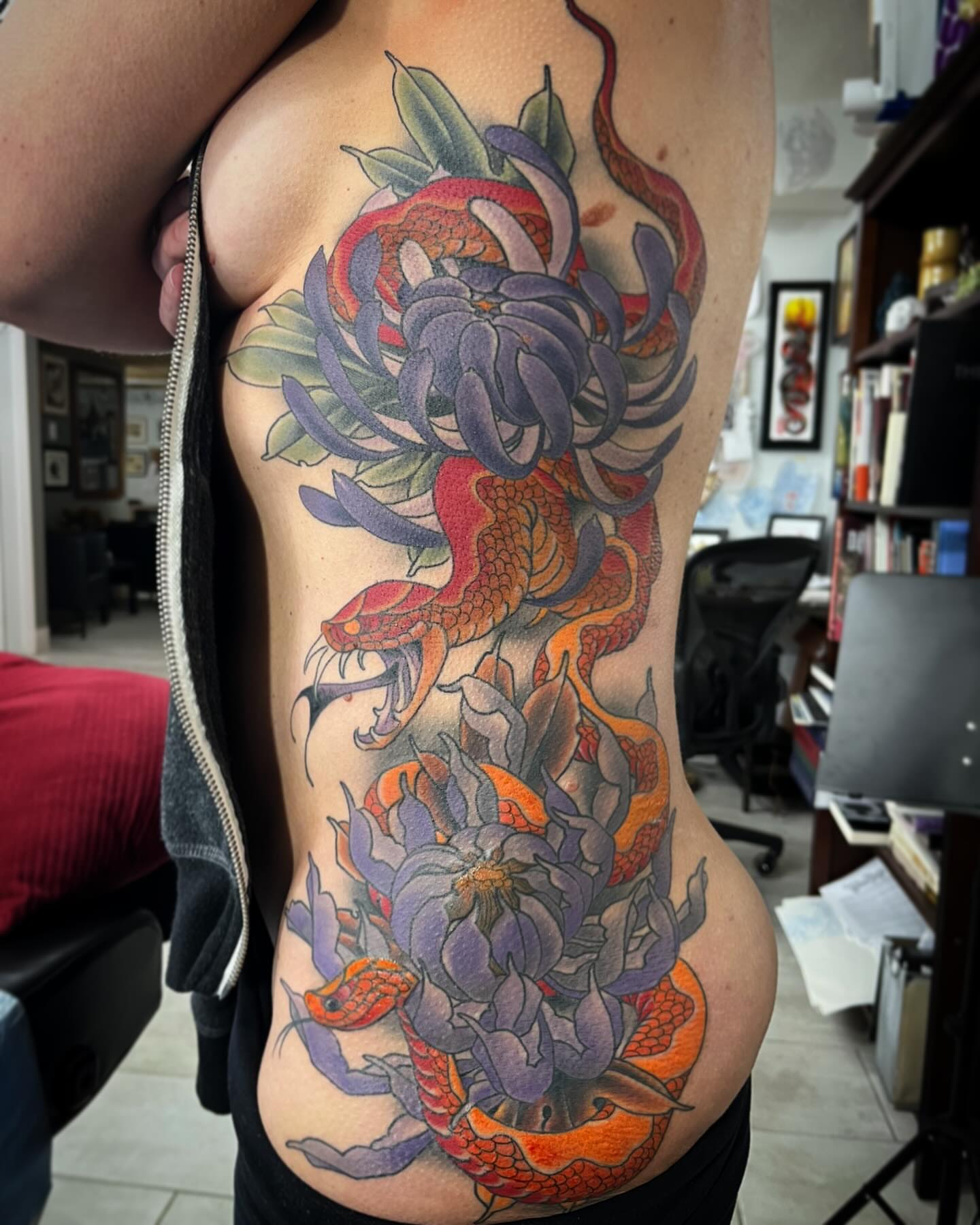 Snake and peony japanese irezumi tattoo on the ribs by biggstattoos