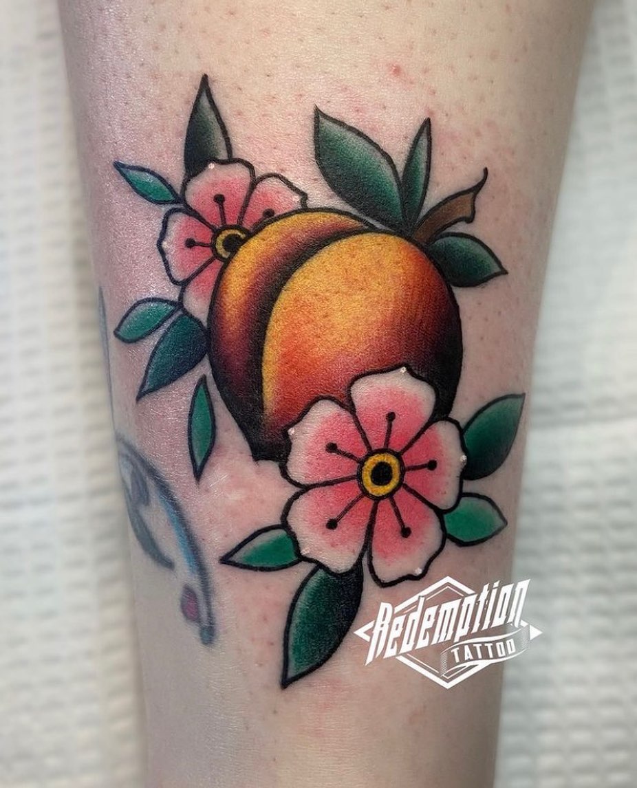 Peach and flowers neo-traditional tattoo on the forearm by Dorrough Tattooer