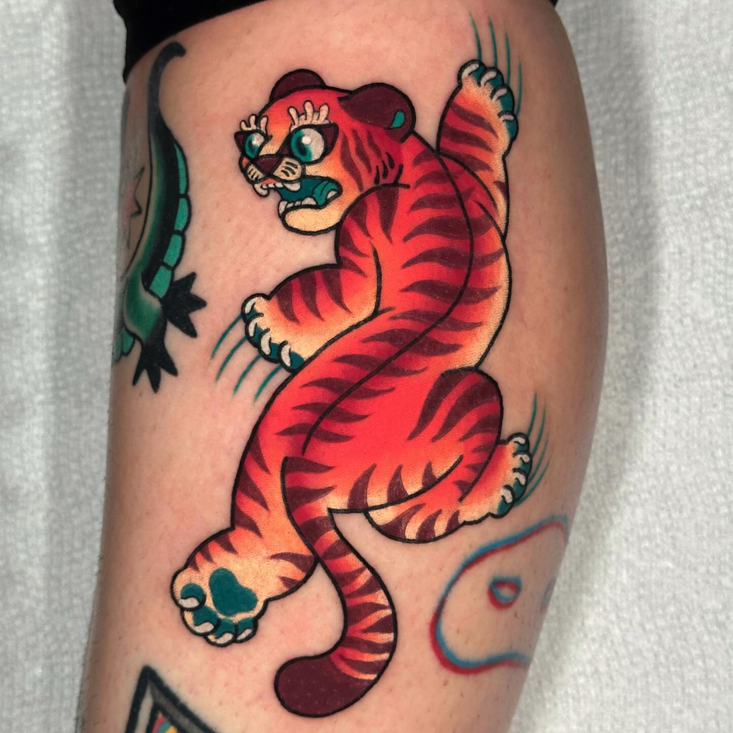 Tiger American traditional tattoo on the thigh by π»πππππ πΉπππ