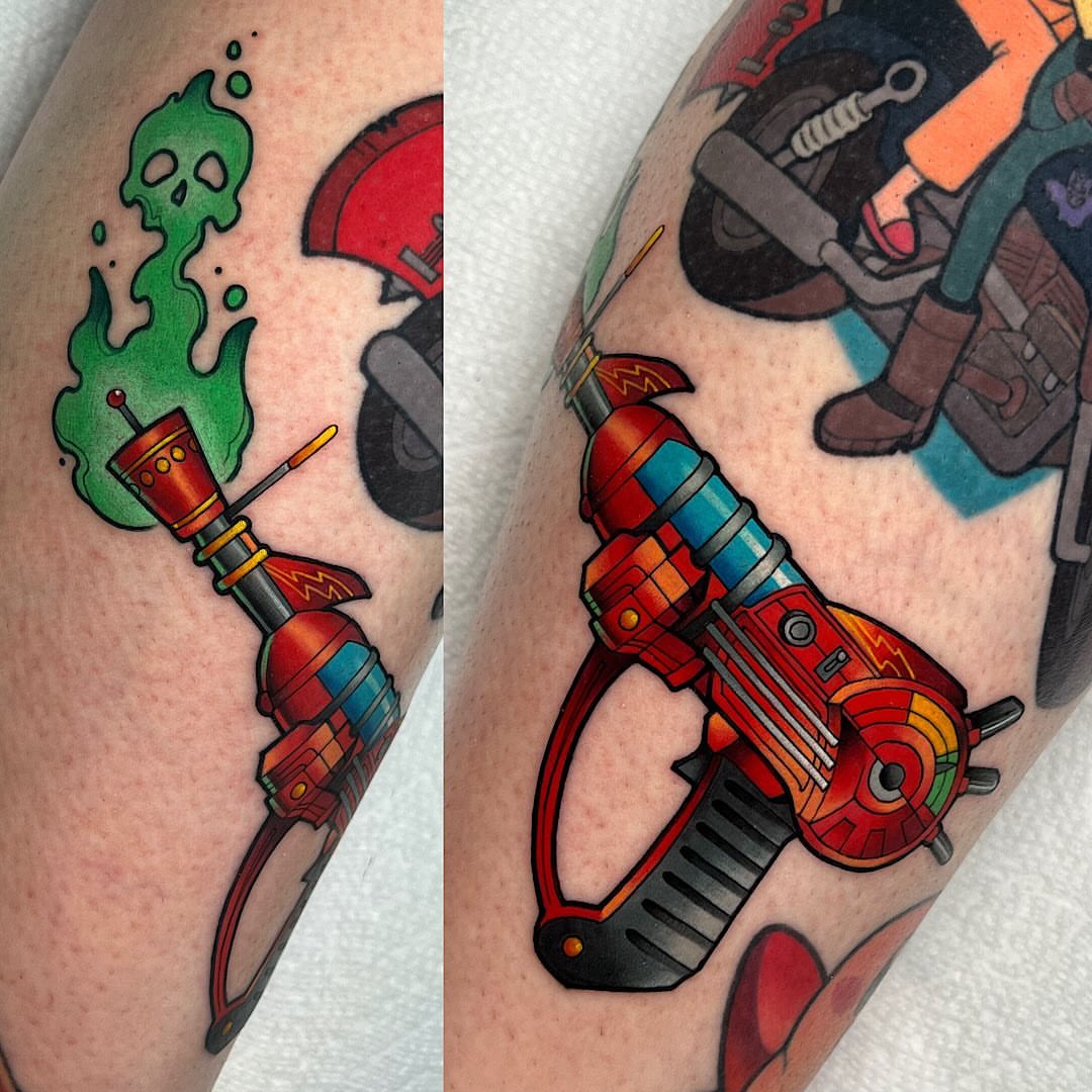 Gun with skull American traditional tattoo on the forearm by Shelby Ouellette