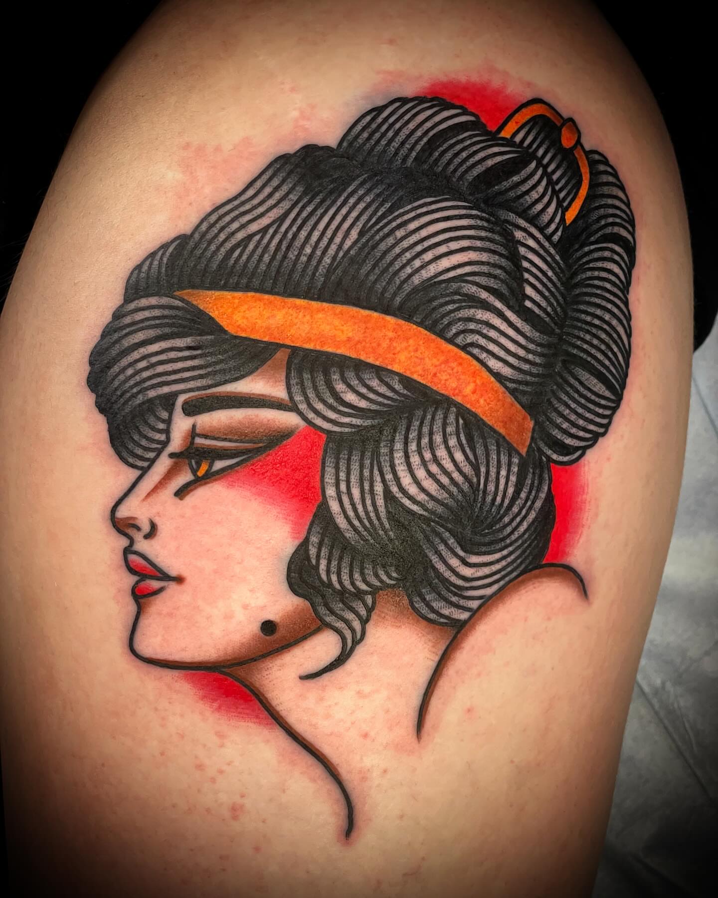 Geisha portrait American traditional tattoo on the shoulder by Alex Muniz