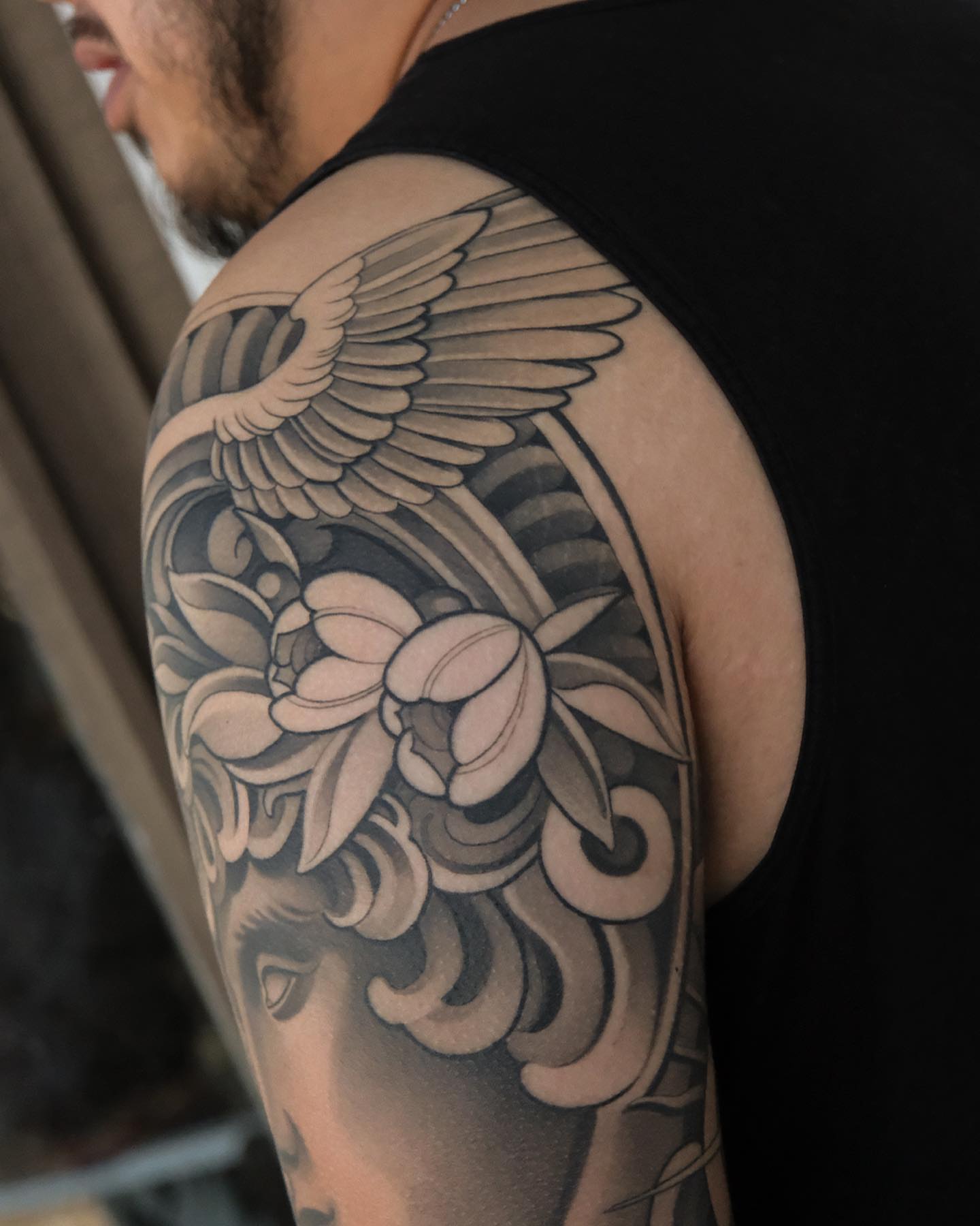 Lotus and wings black and grey tattoo on the shoulder by ๐ฃ๐๐๐ ๐๐ ๐ฆ๐๐๐ฉ๐