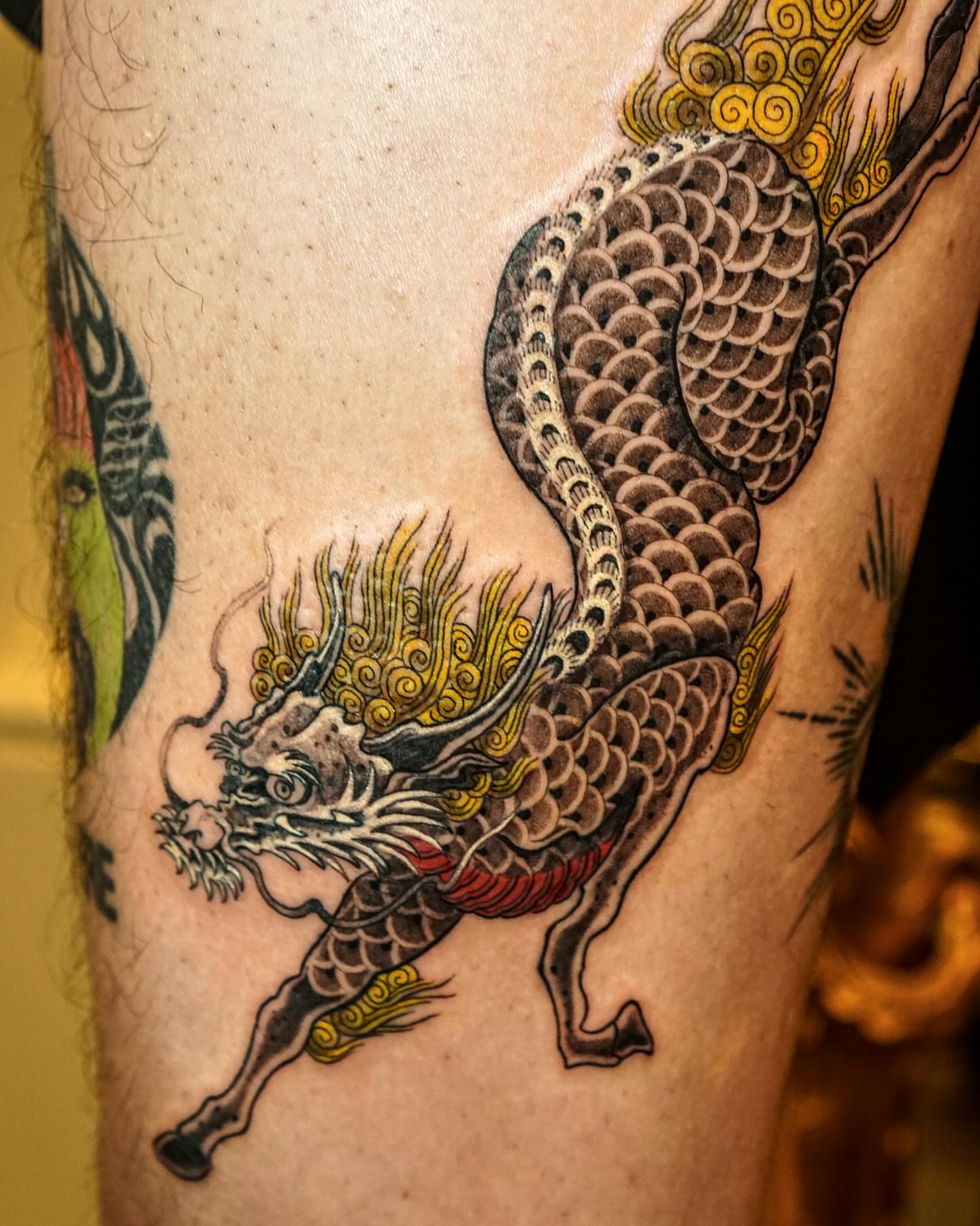 Dragon japanese irezumi tattoo on the thigh by Swani