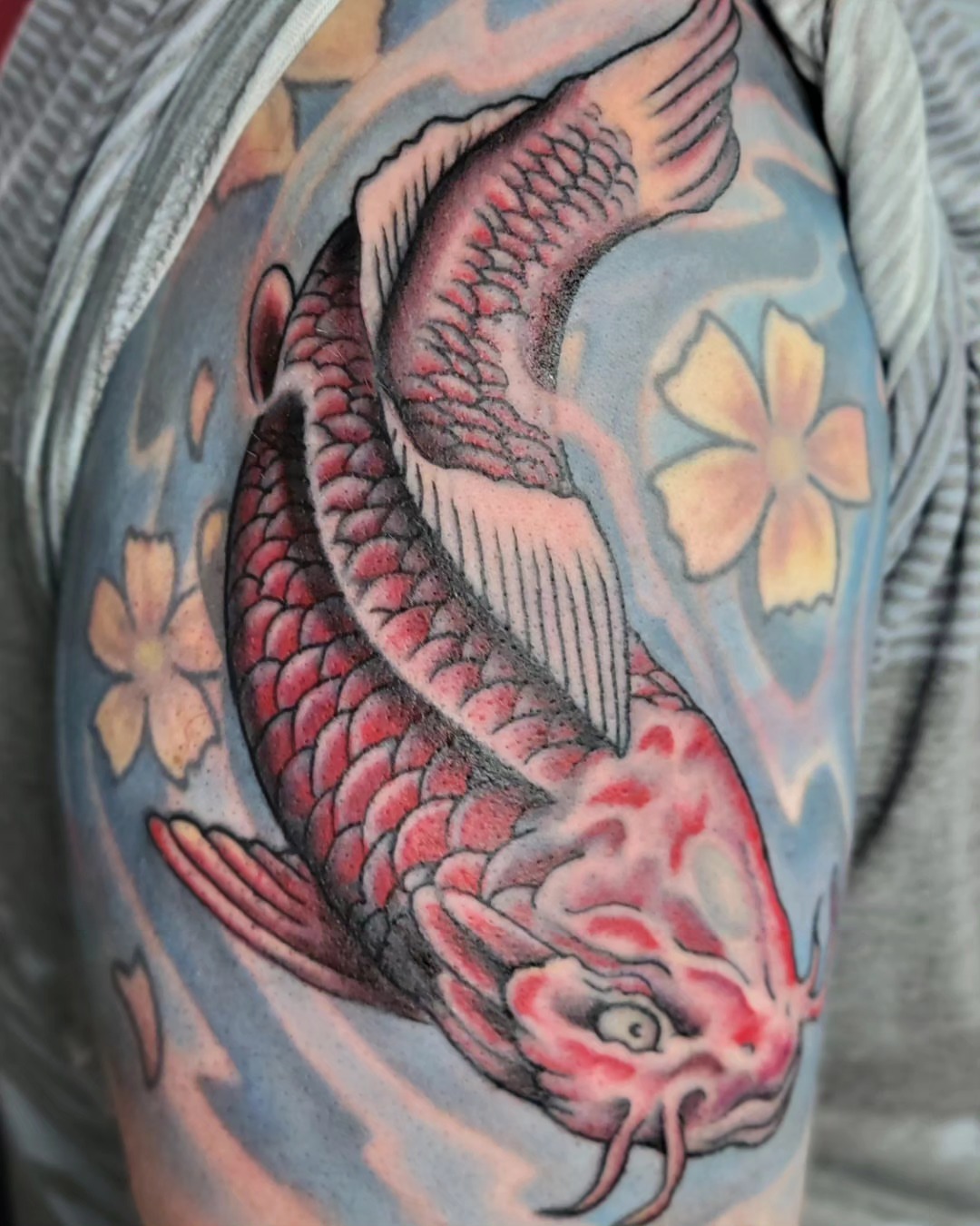 Koi fish japanese irezumi tattoo on the shoulder by Tim Andrews