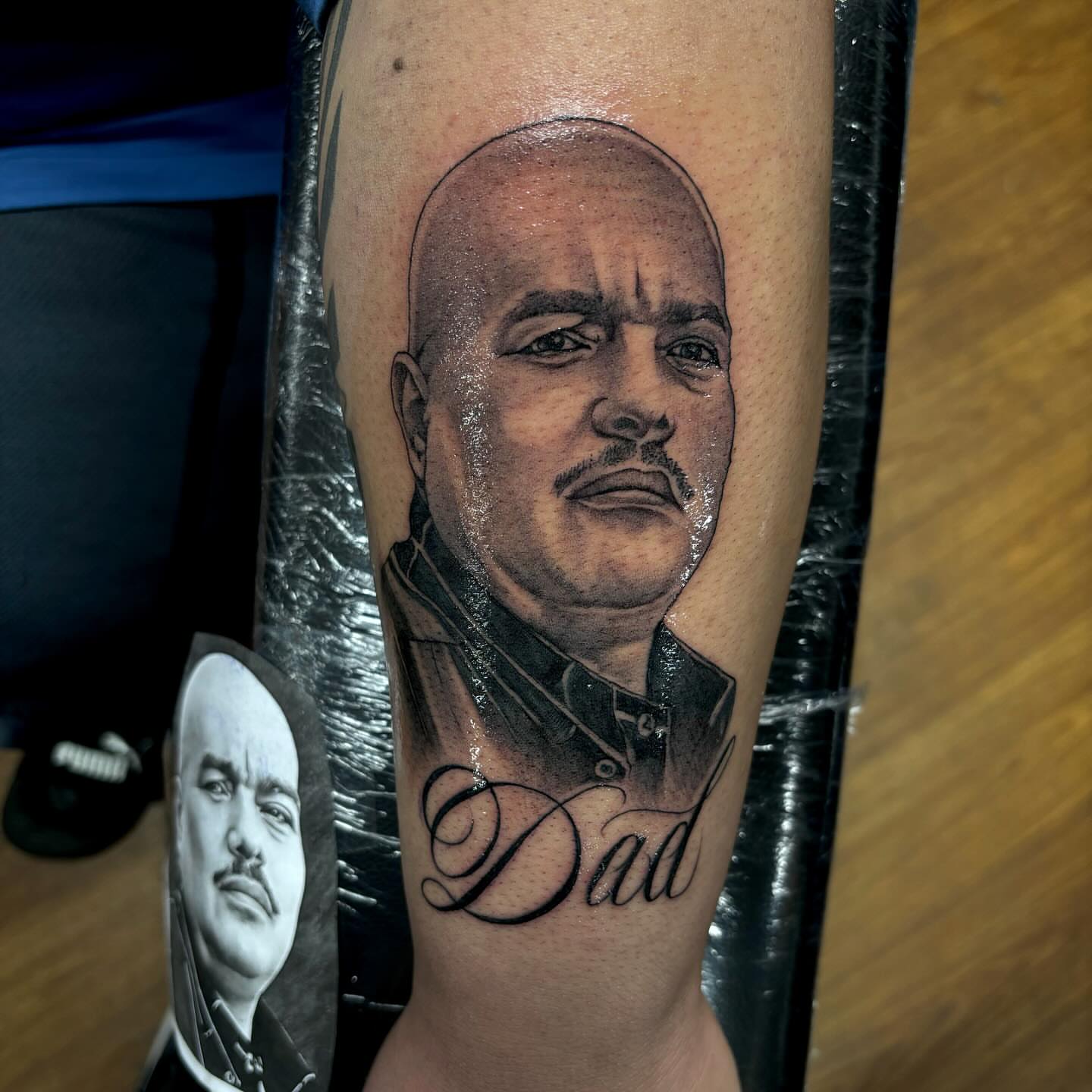 Portrait of a man realism tattoo on the forearm by Dallas Tattoo Artist