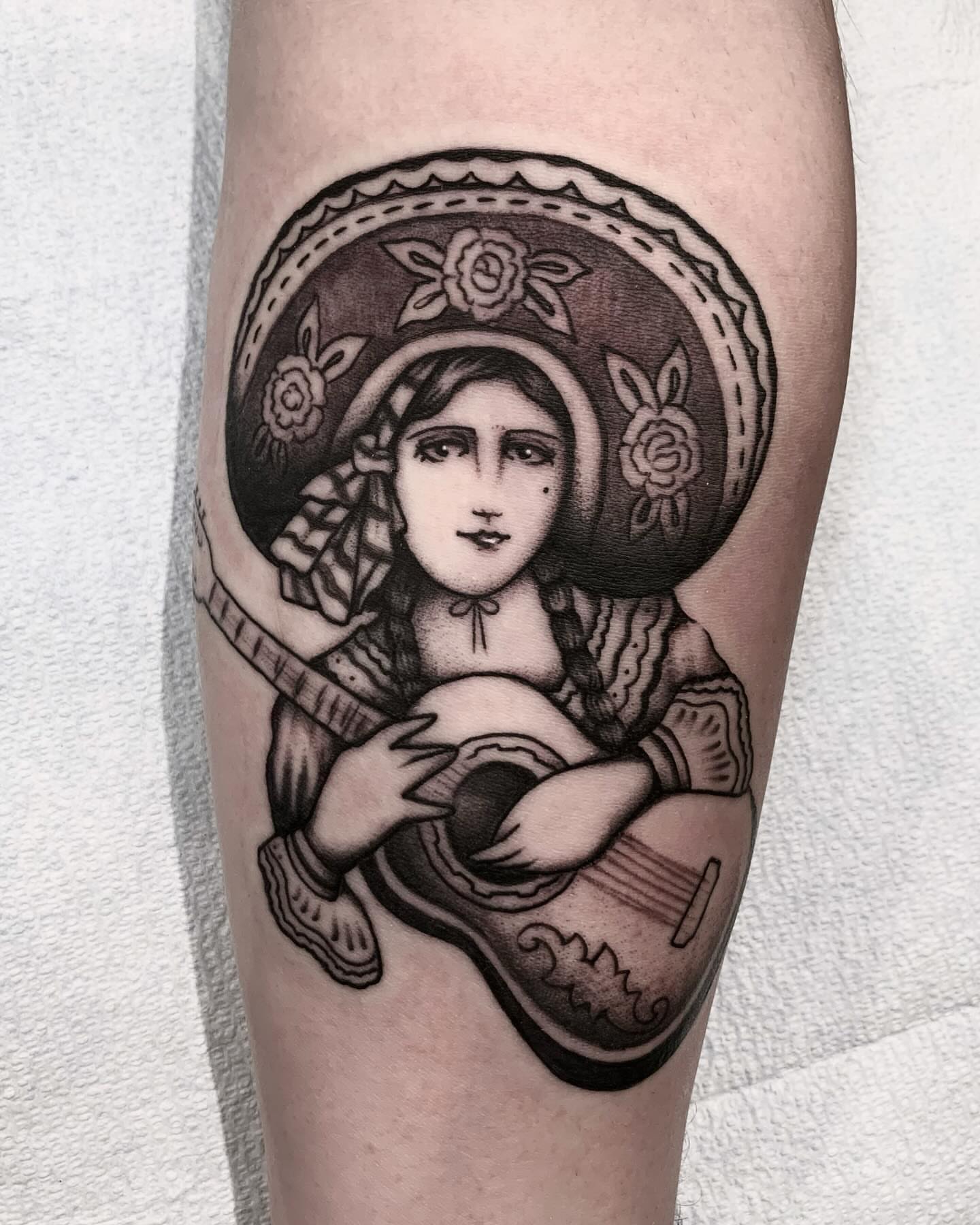 Religious figure black and grey tattoo on the forearm by Weston Imhoff