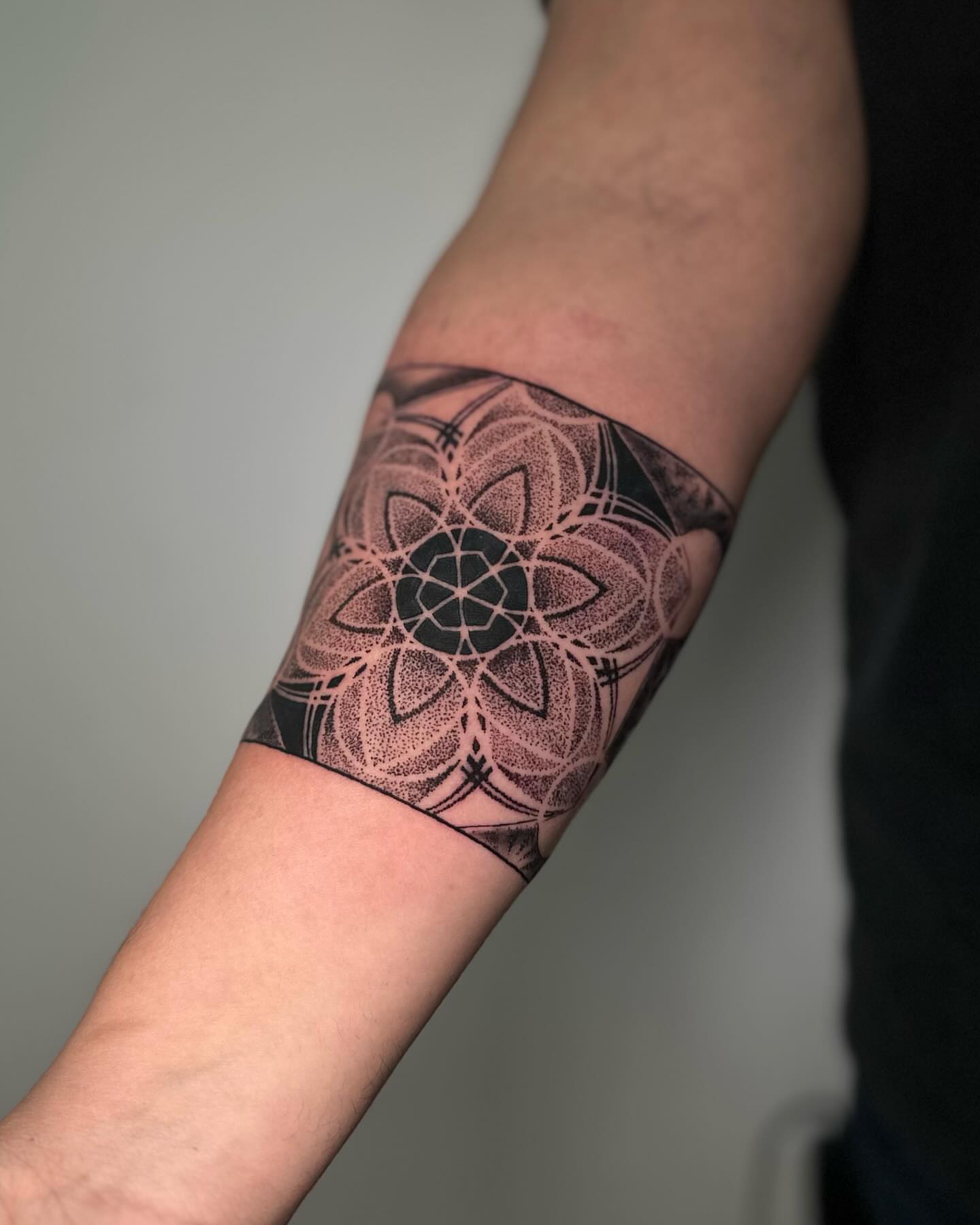 Tattoo by @romanostattoo — dotwork, geometric
