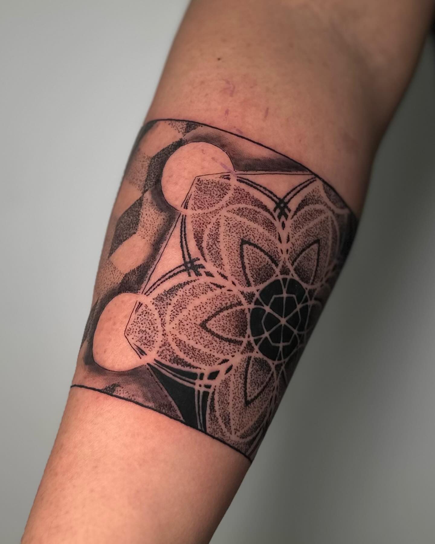 Tattoo by @romanostattoo — dotwork, geometric