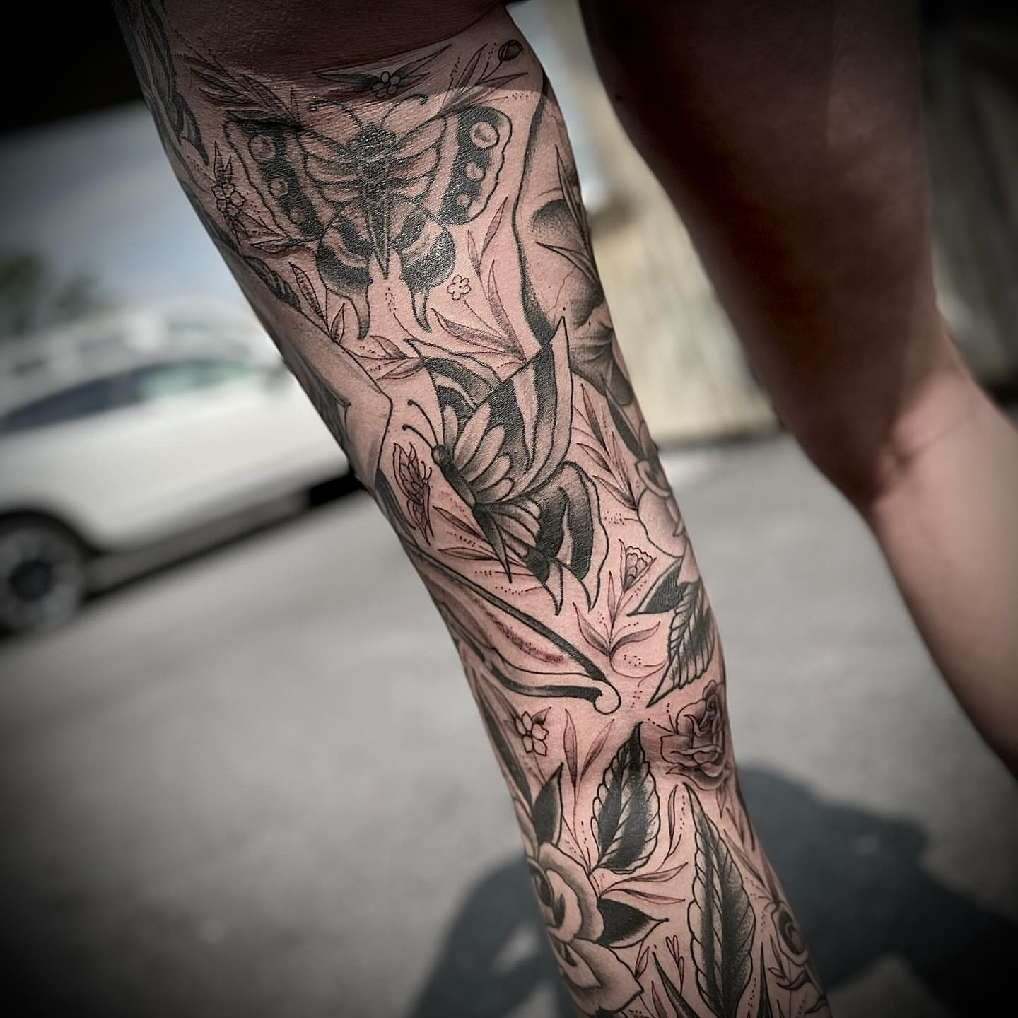 Butterflies and flowers American traditional tattoo on the forearm by Troy Mort, Altoona, Pennsylvania
