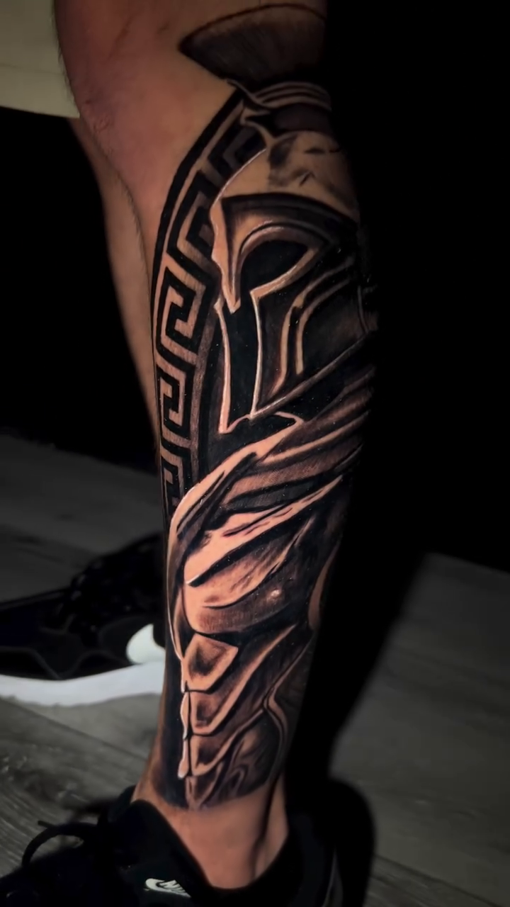 Spartan helmet and armor realism tattoo by Rafa