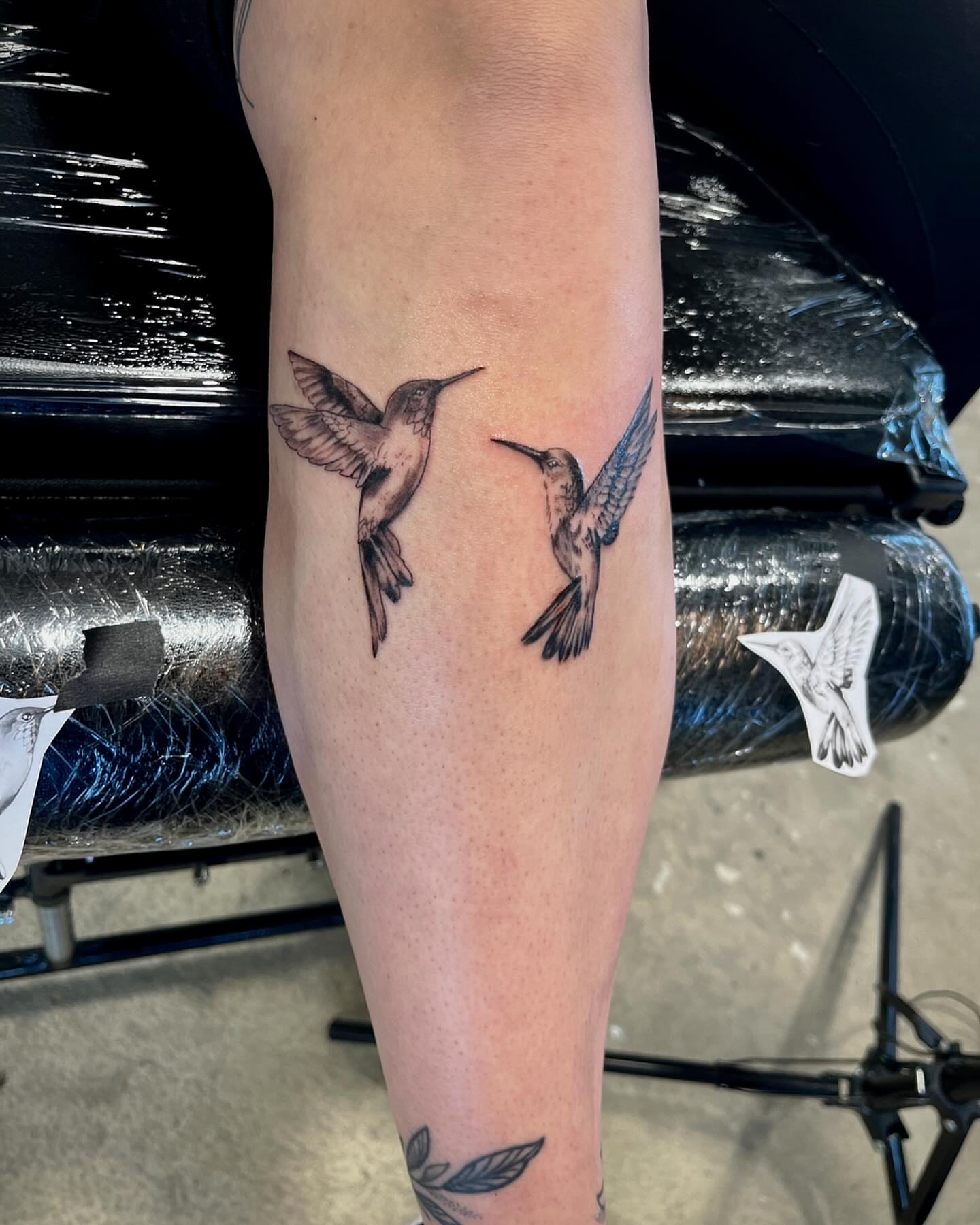Hummingbirds realism tattoo on the forearm by Deville Pinson