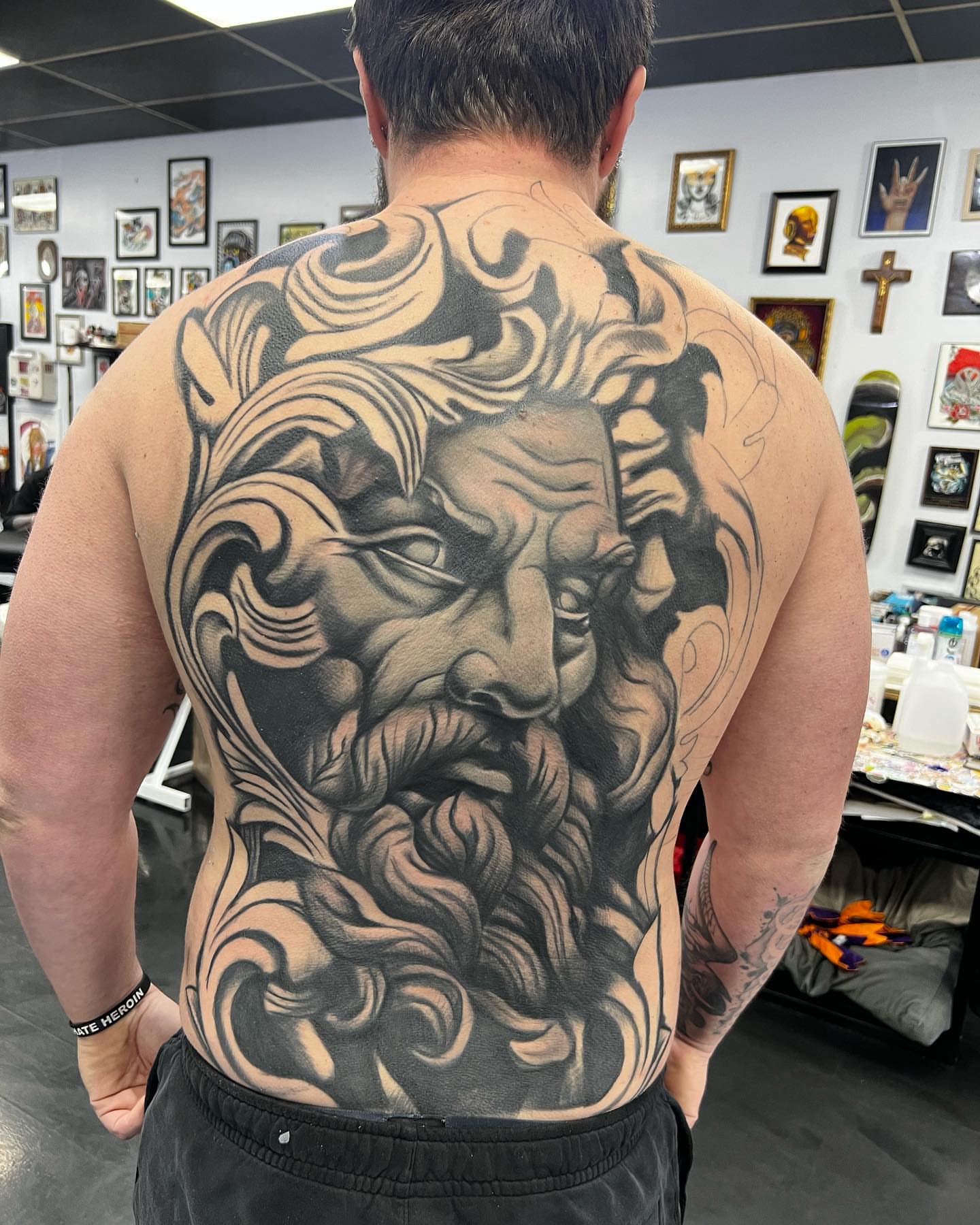 Tattoo by @burkes.body.graphic — black_and_grey, realism