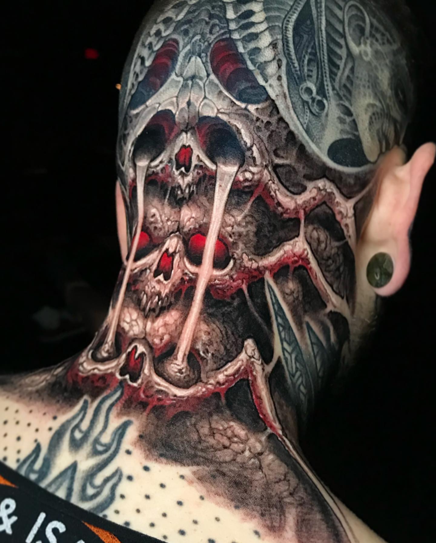 Skull dark realism tattoo on the neck by Brandon Herrera