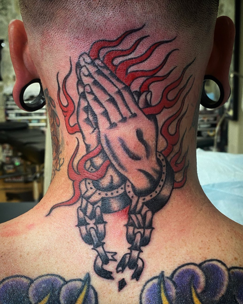 Praying hands with flames American traditional tattoo on the neck by Alan Pham, San Jose, California
