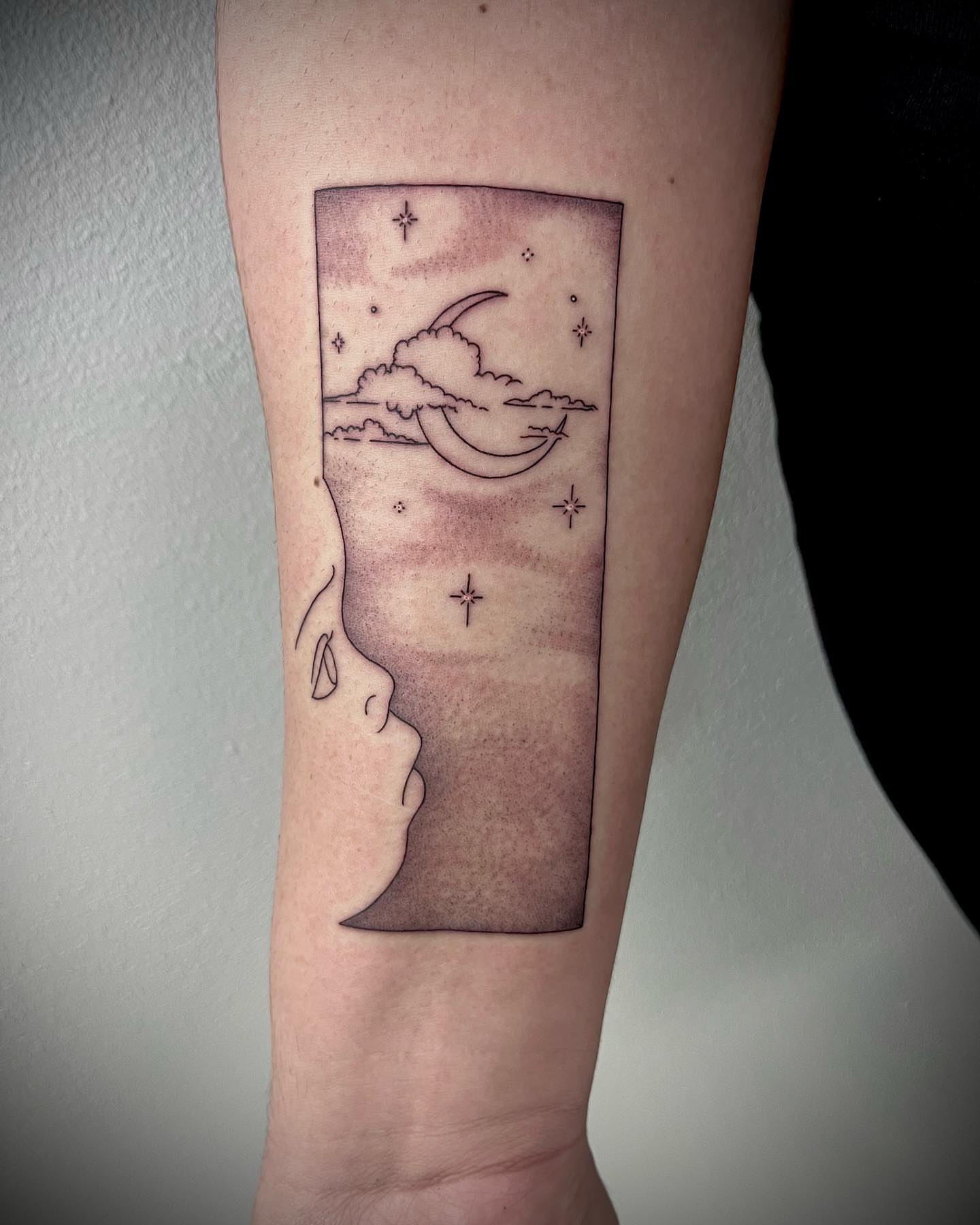 Moon and clouds black and grey tattoo on the forearm by oh hey, robin.