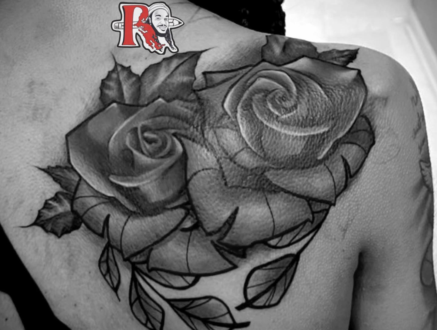 Rose realism tattoo on the shoulder by Chicago Tattoo Artist