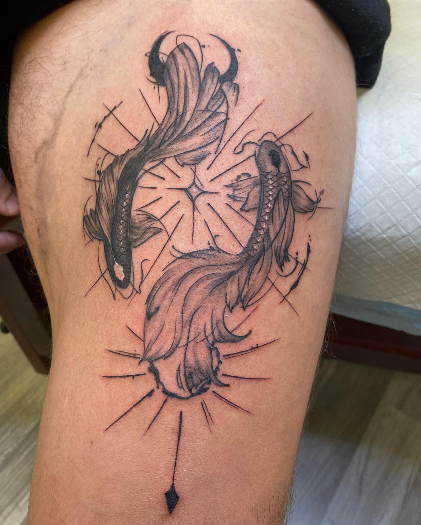 Koi fish black and grey tattoo on the thigh by Tattertot