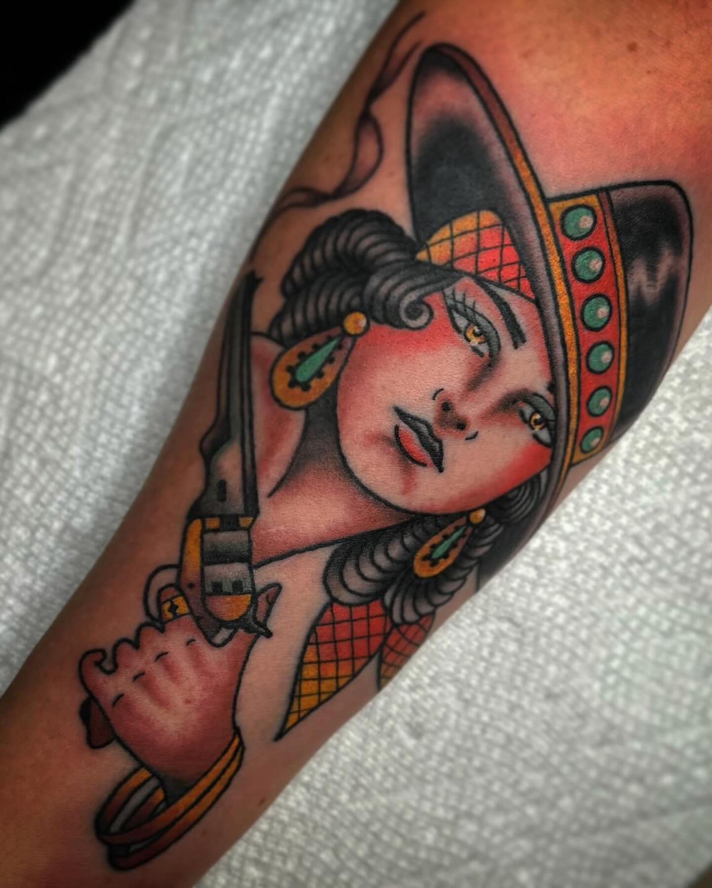 Woman with sword American traditional tattoo on the forearm by Drew McElveney, Austin, Texas