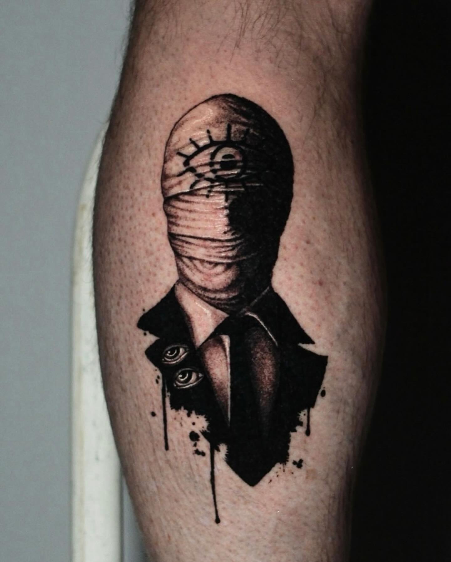 Mummy head with eyes dark realism tattoo on the forearm by H.black