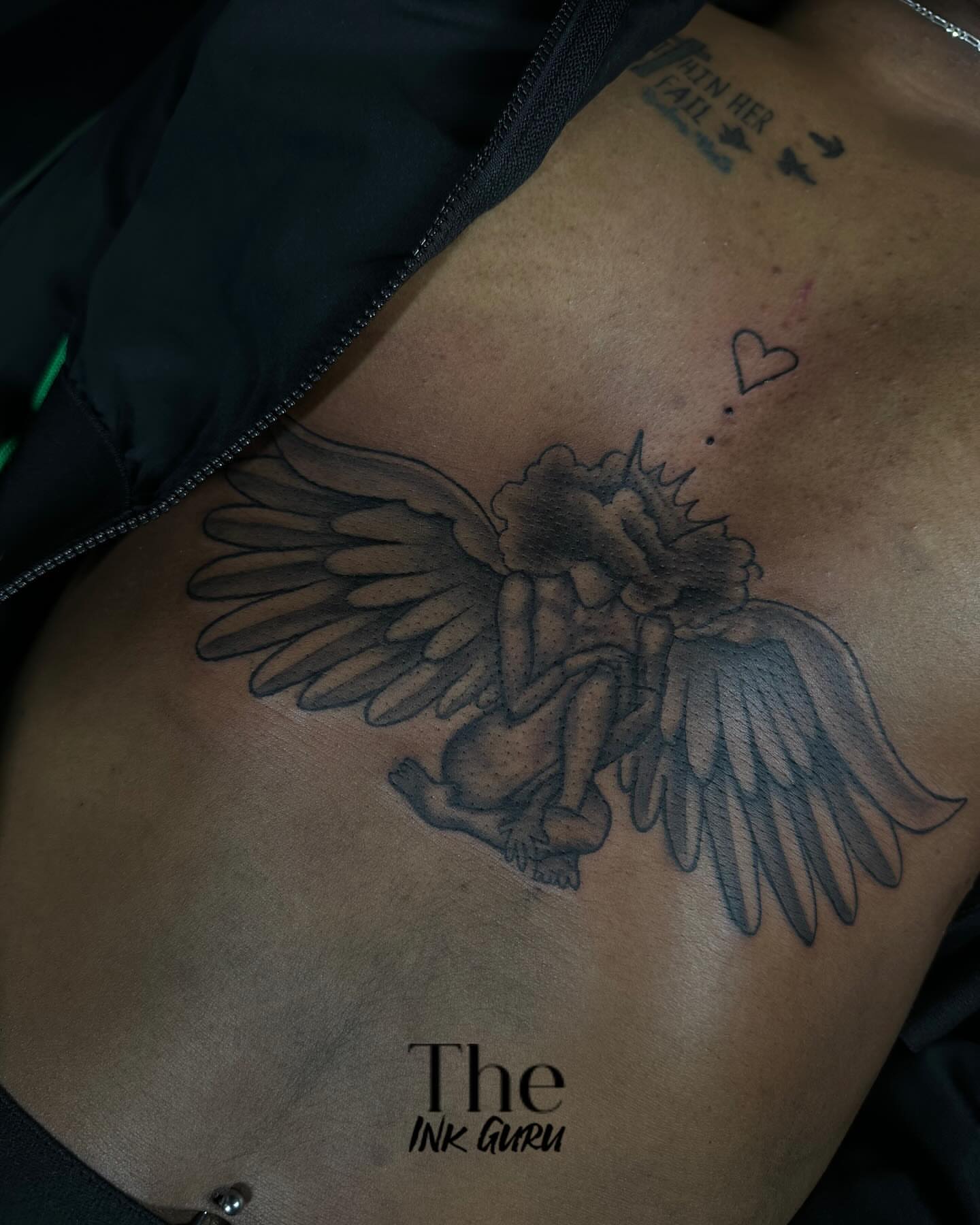 Angel black and grey tattoo by The Ink Guru.