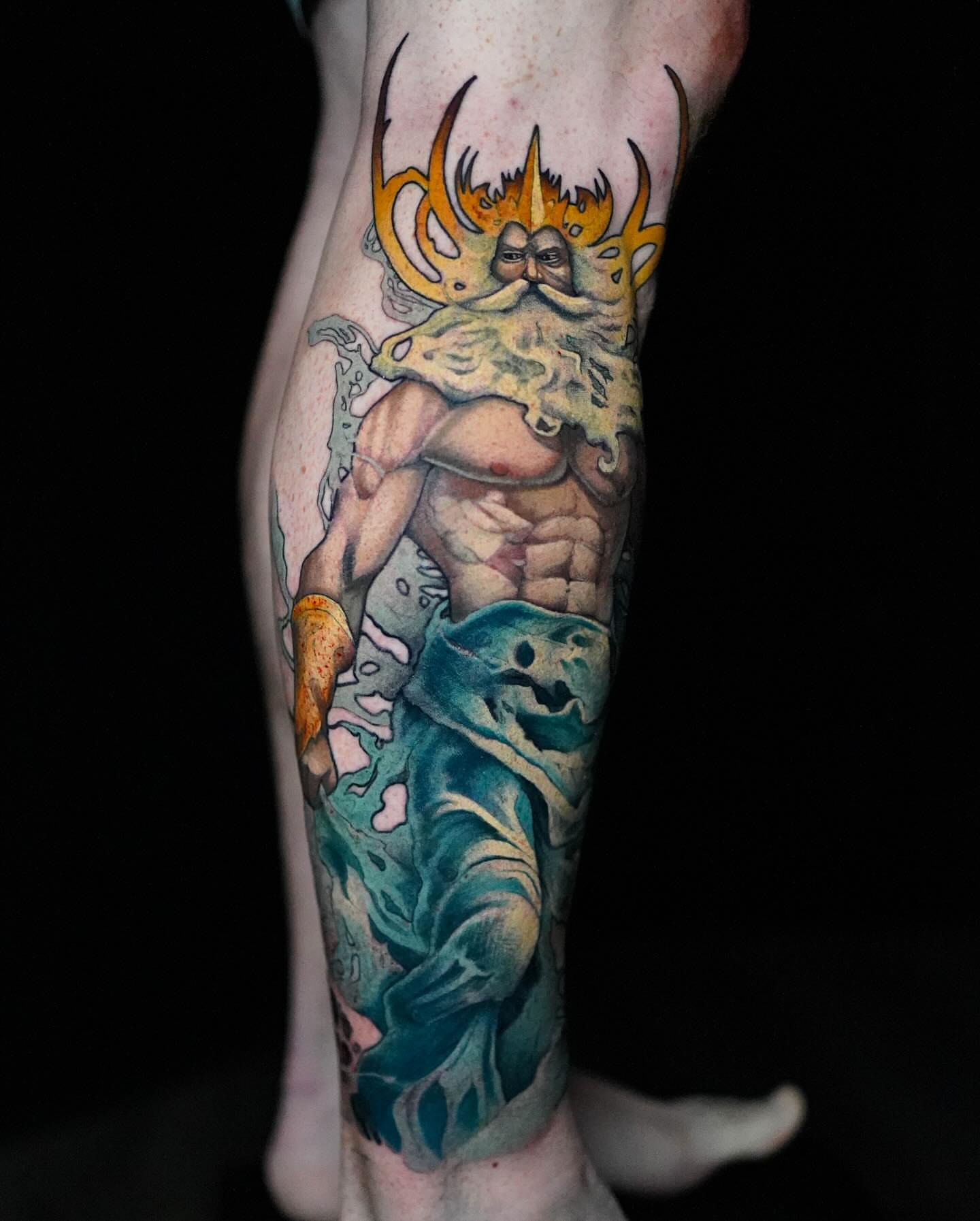 Merman with crown realism tattoo on the forearm by Danny Madsen