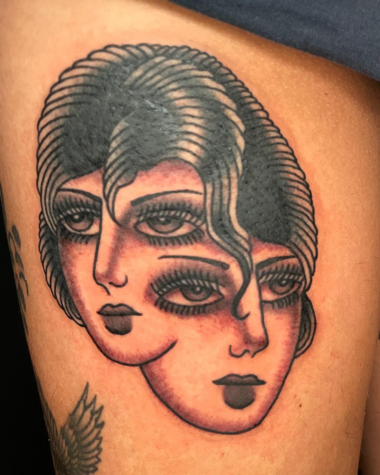 Flapper girl American traditional tattoo on the thigh by Seth Griffin