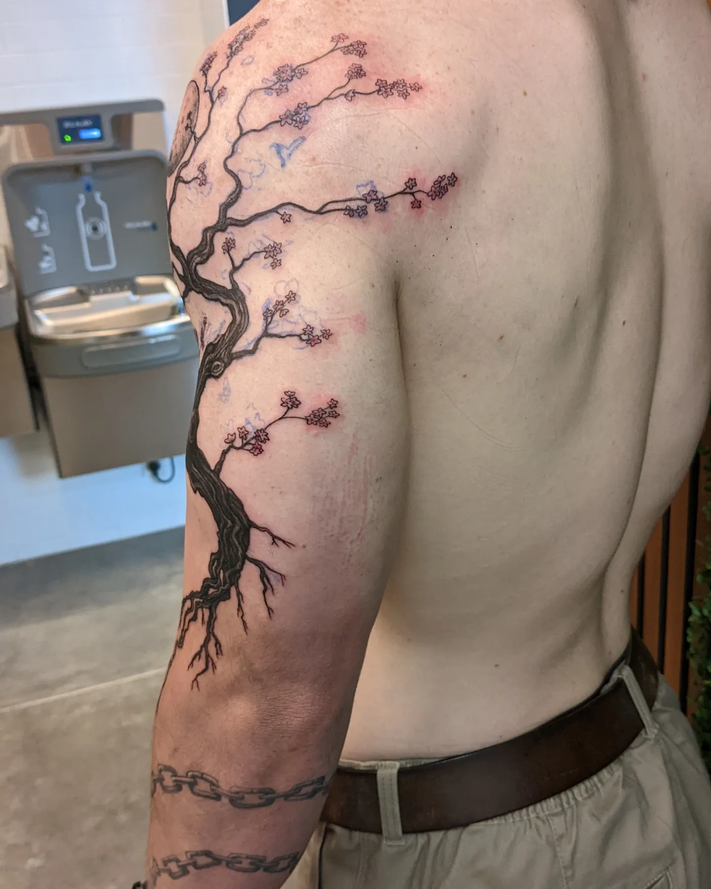 Cherry blossom tree fine line tattoo on the upper arm by ⁘ heléna tupou-lisle ⁘
