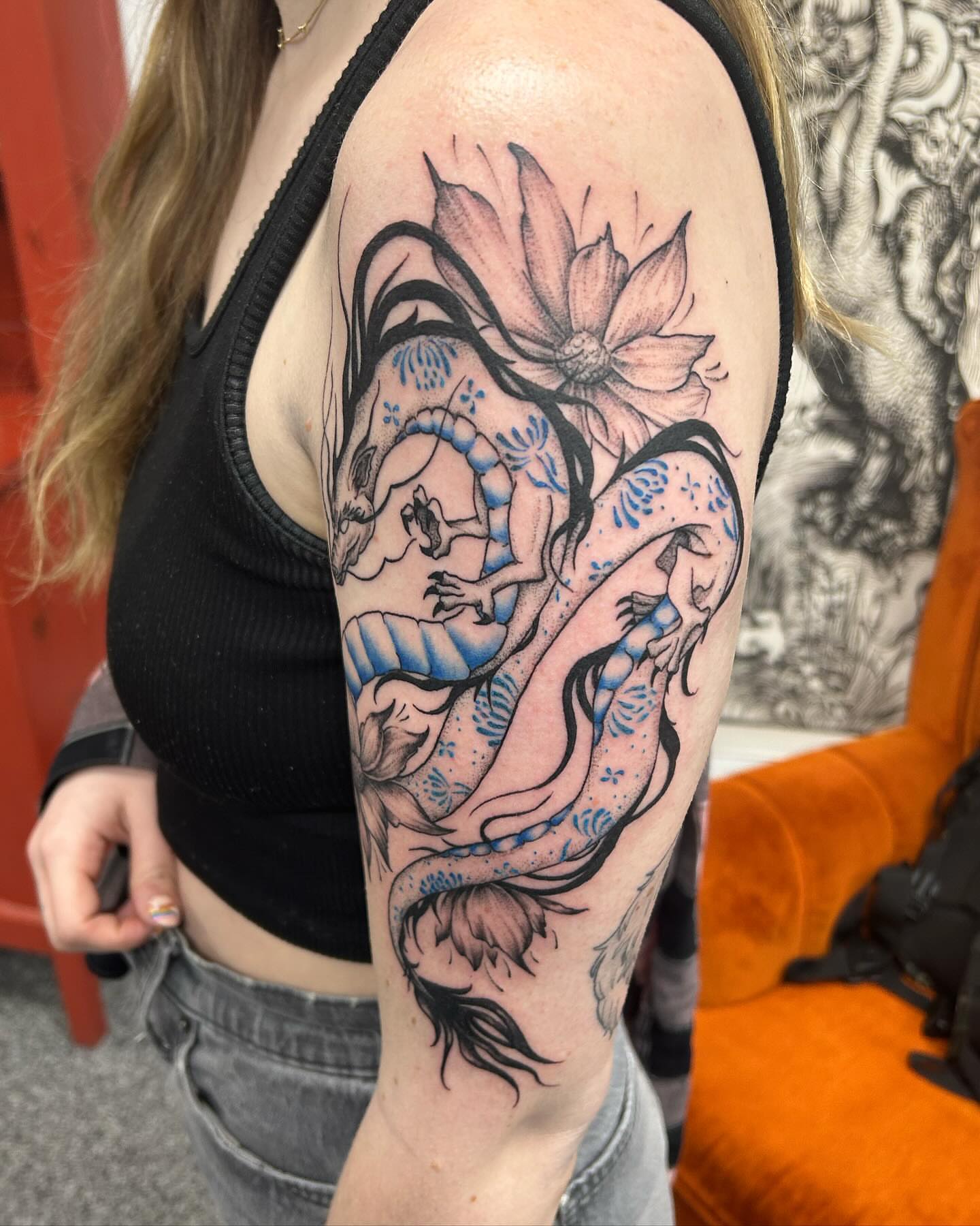 Serpent and lotus japanese irezumi tattoo on the forearm by Jayda Shell