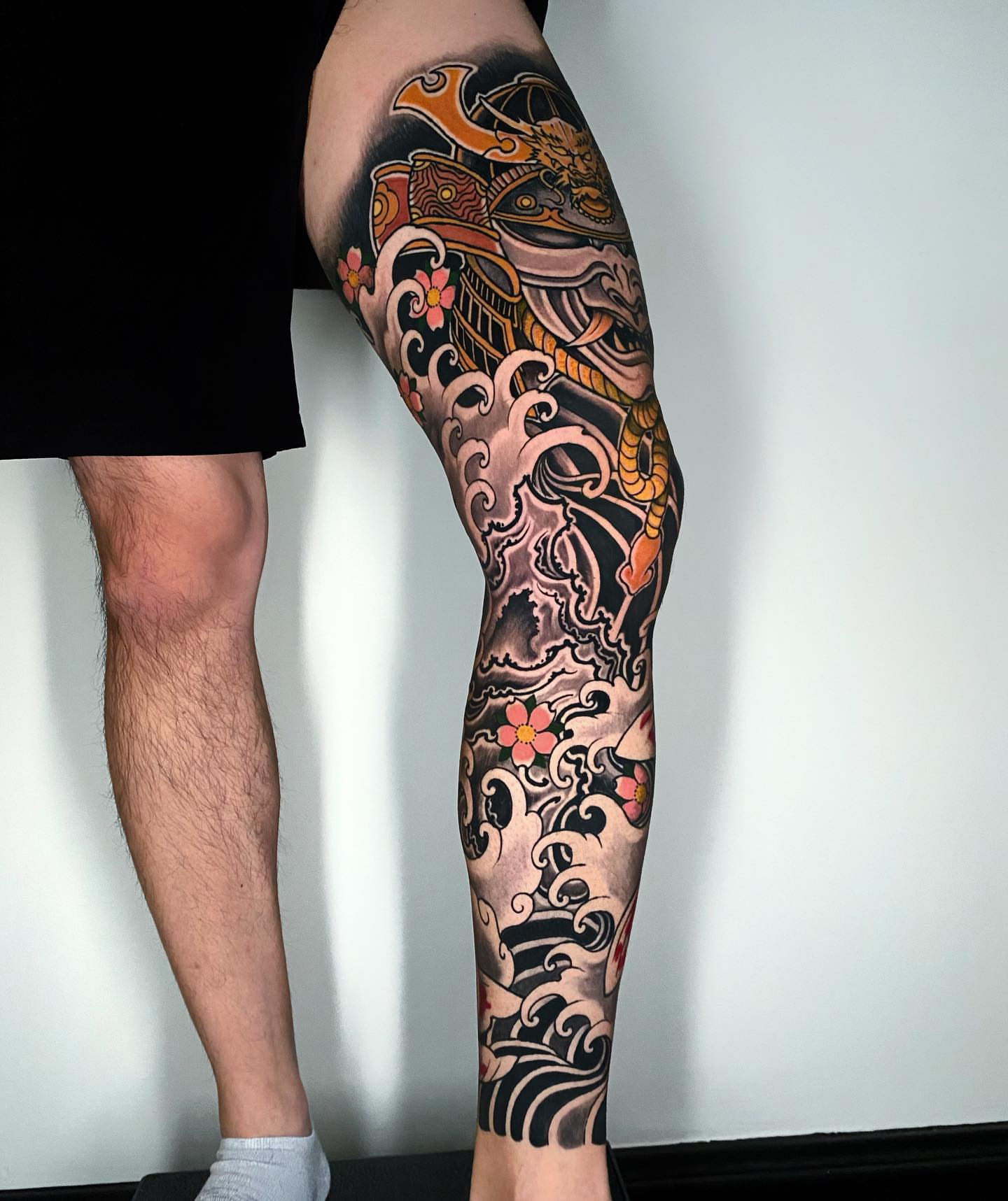 Koi fish and waves japanese irezumi tattoo on the calf by H O R I H A N