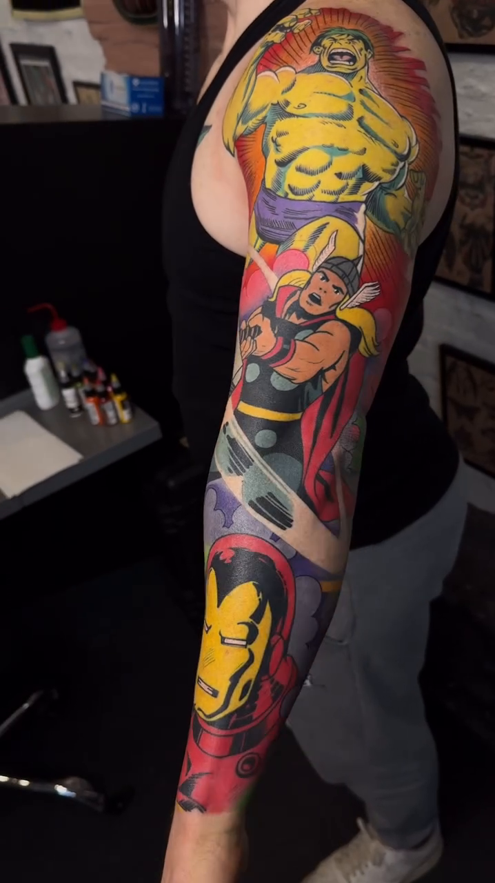 Marvel superheroes sleeve new school tattoo by Bradley Dozier
