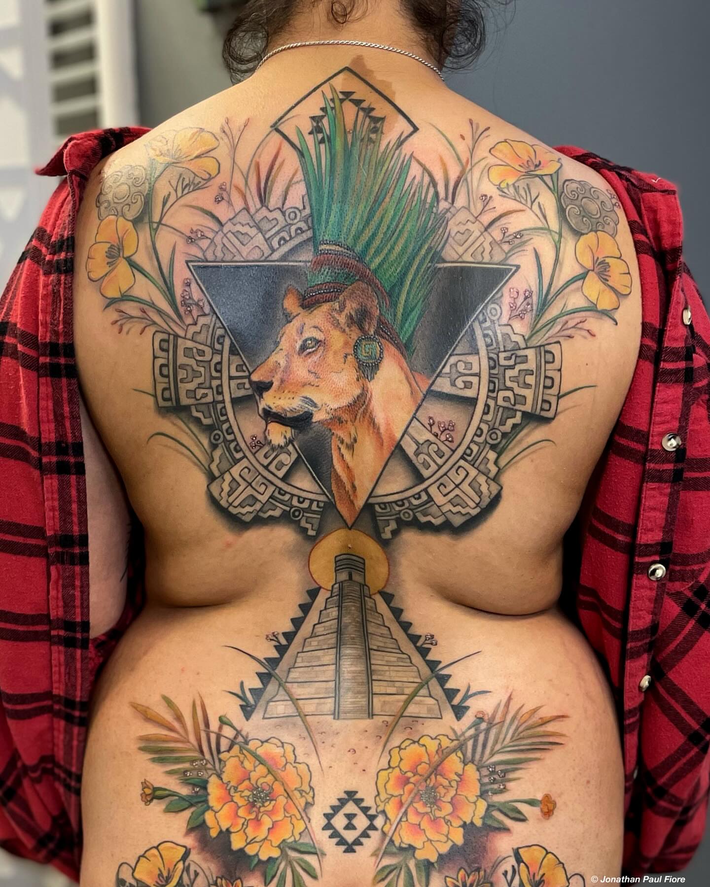 Lion and pyramid American traditional tattoo on the back by Jonathan Paul Fiore, Austin, Texas